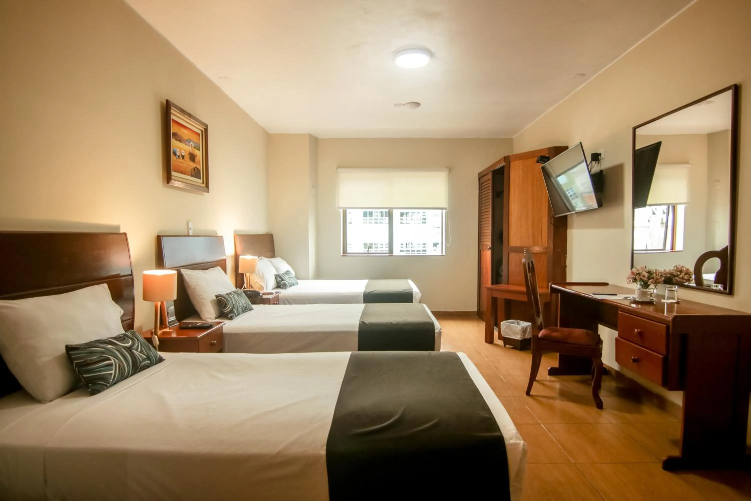 Communal lounge/ TV room, Bed in Epiqus Hotel