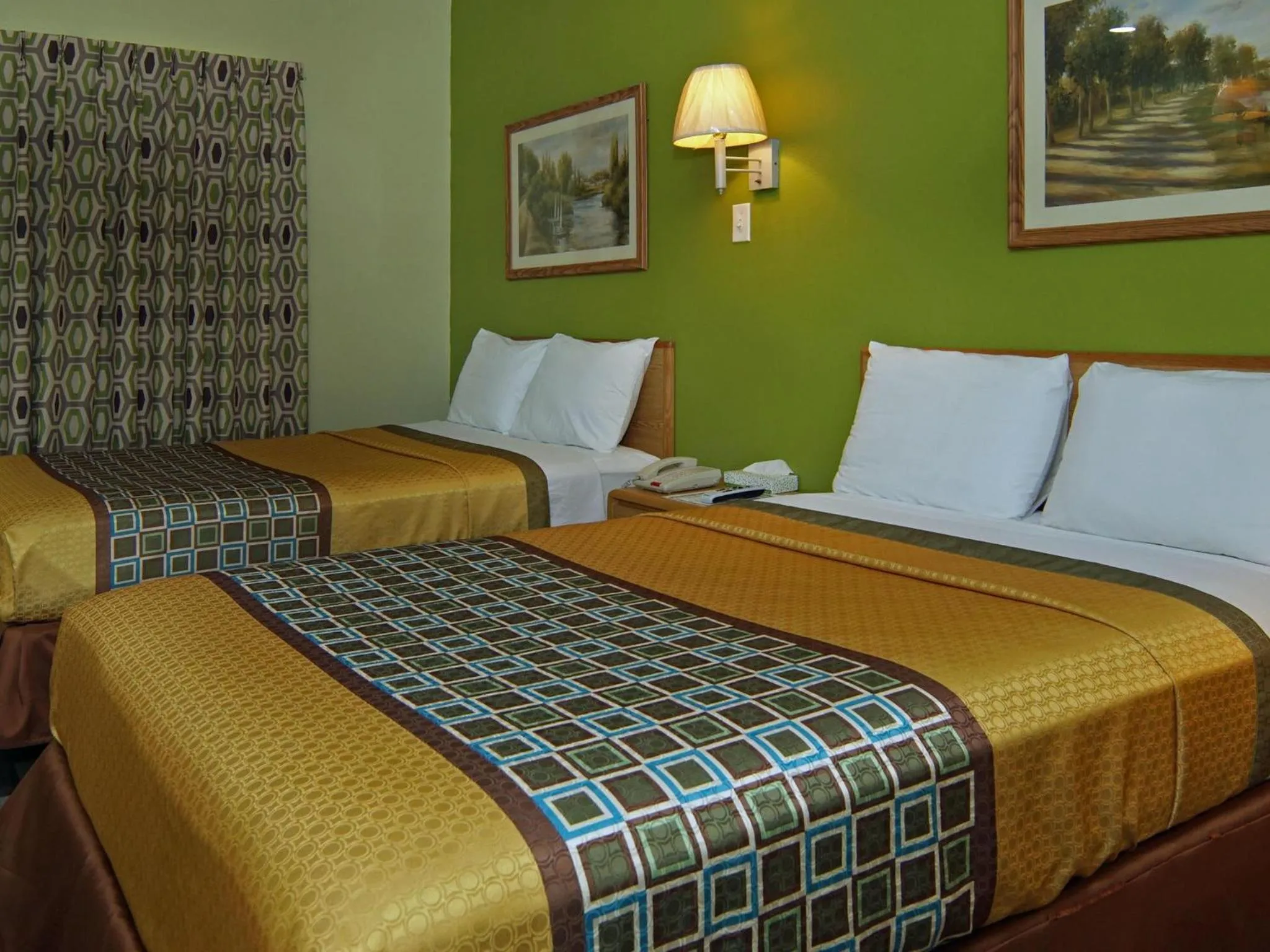 Bed in Quality One Motel