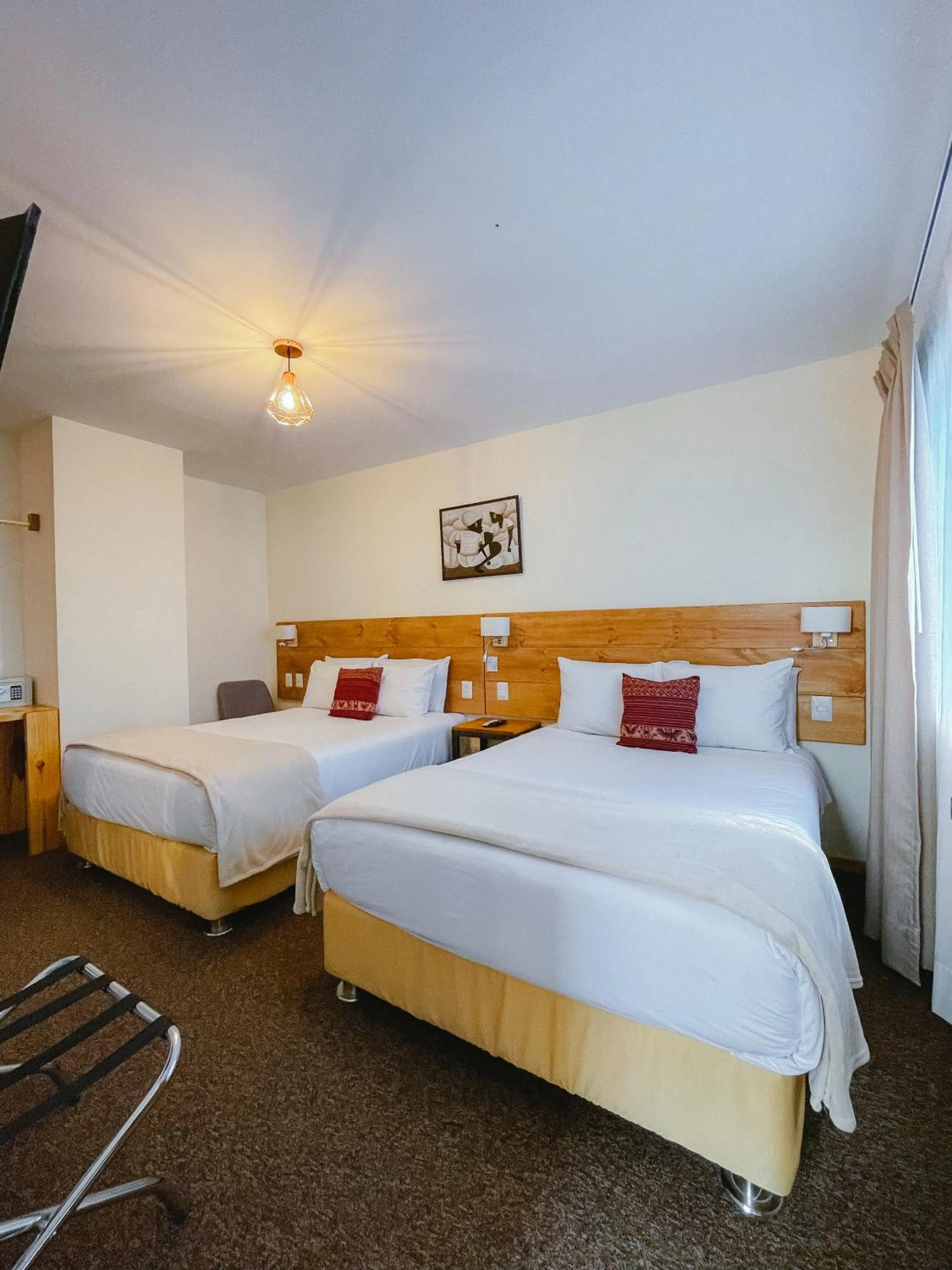 Bed in Cooper Hotel Boutique