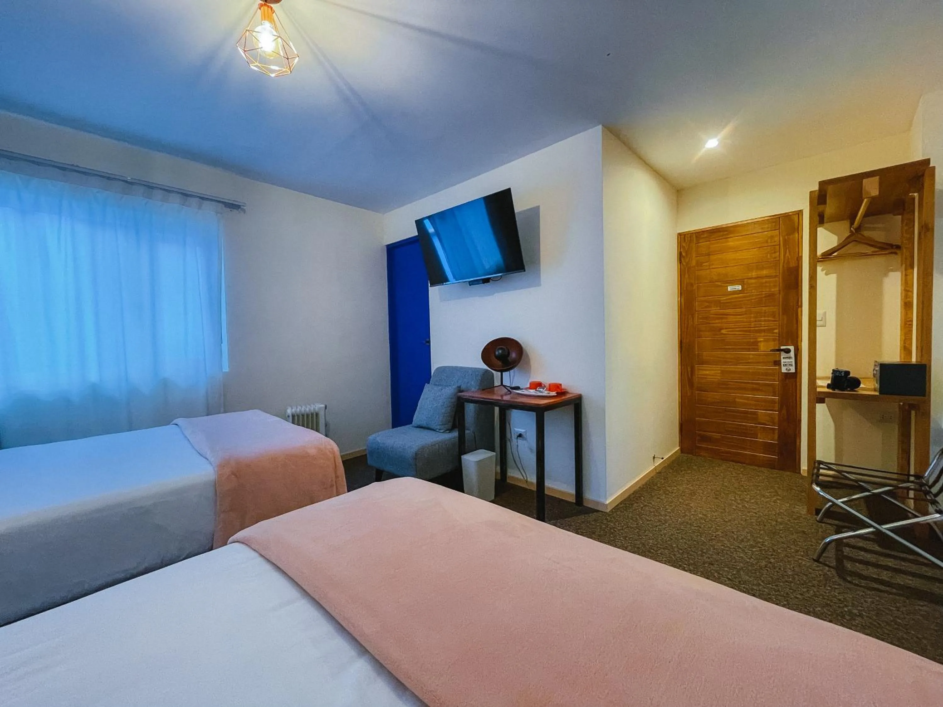 Bed in Cooper Hotel Boutique