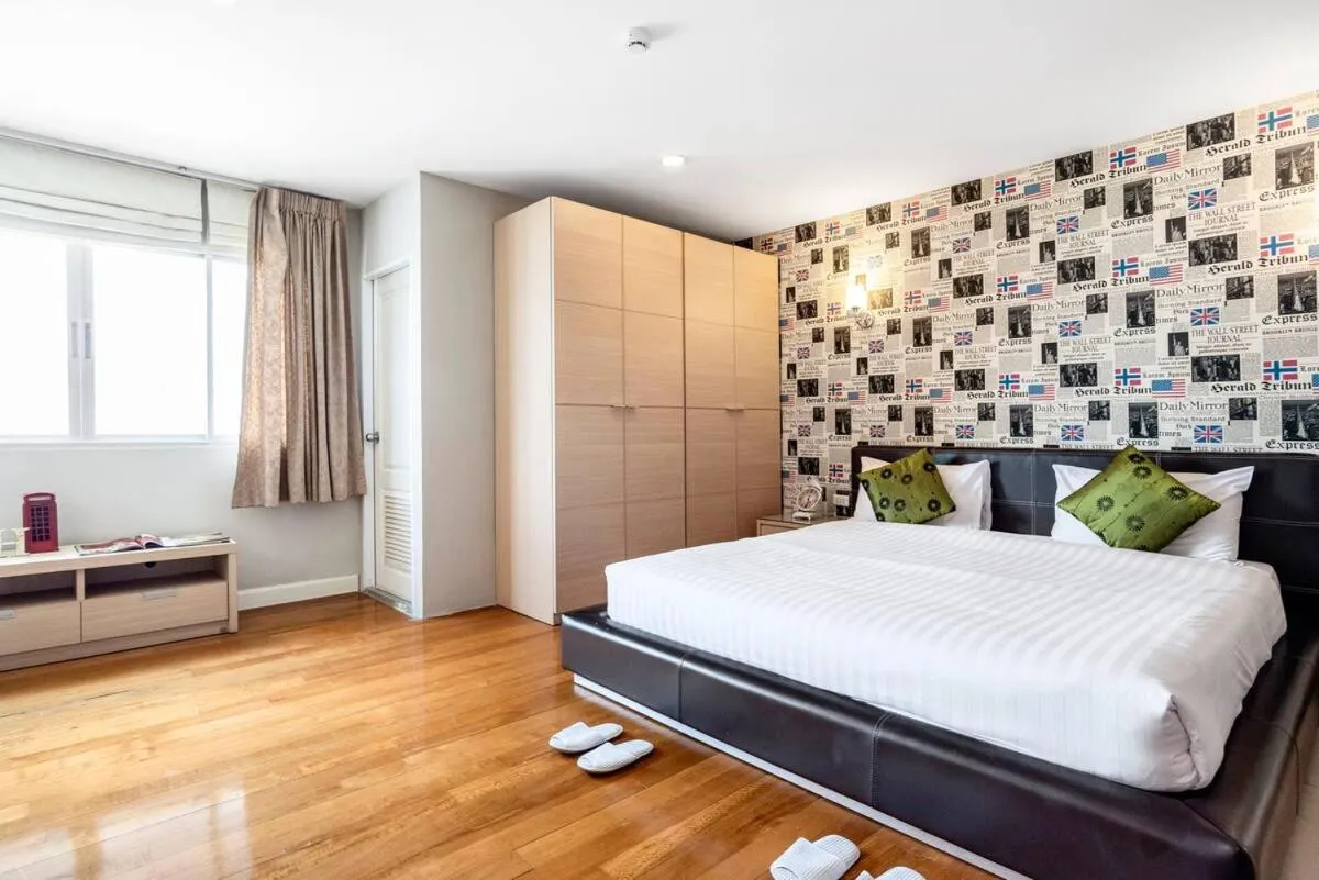 Bed in Nara Suite Residence Bangkok