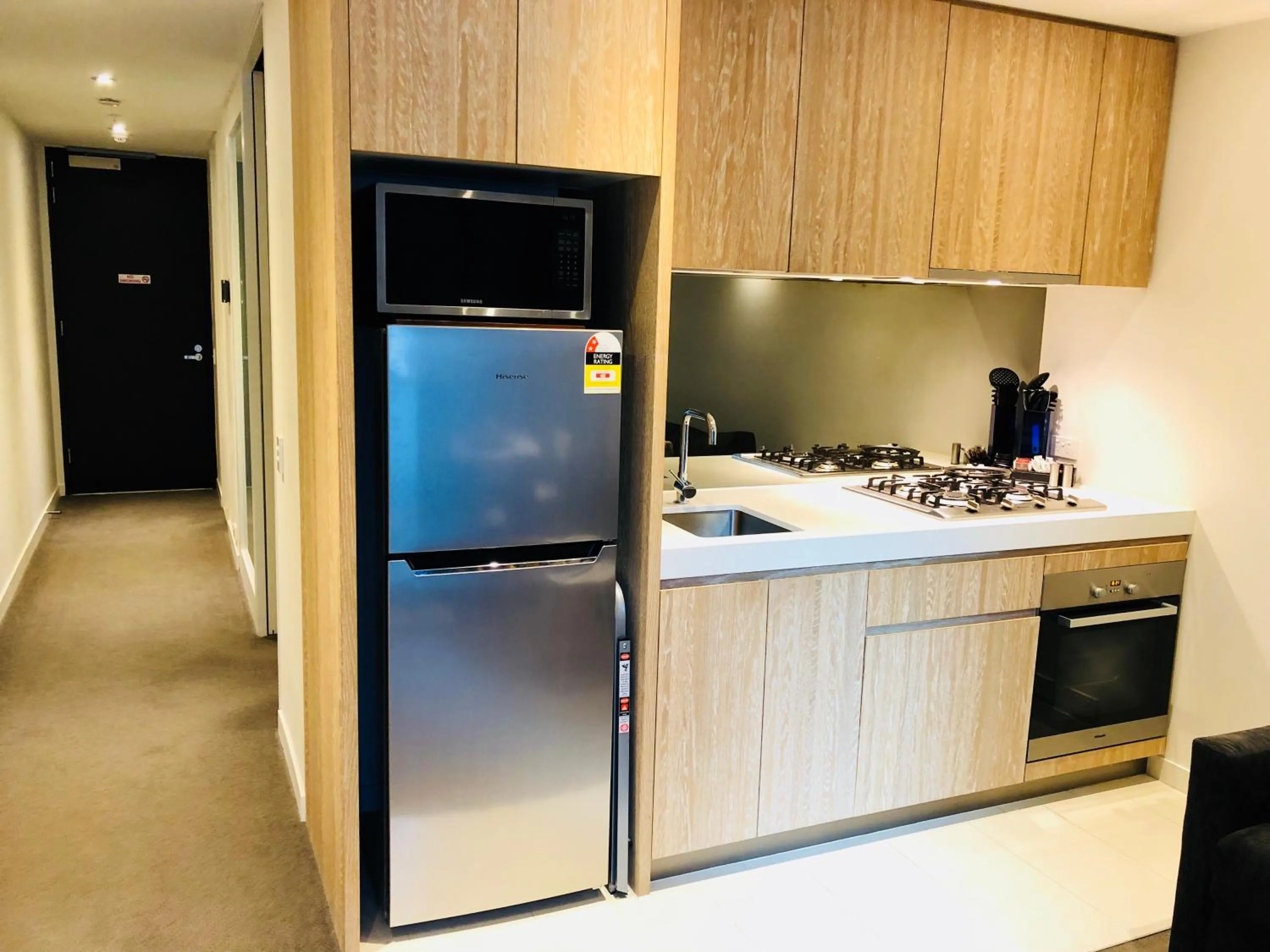 Kitchen or kitchenette in Flinders Street Apartments
