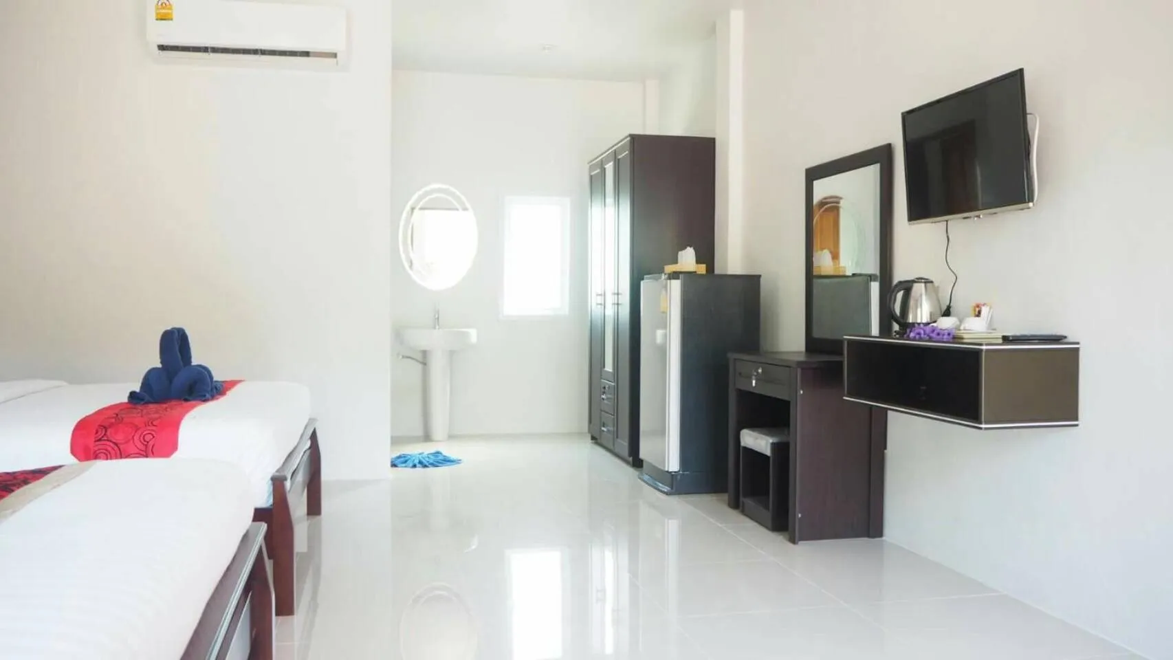 Bed in Tamarind Lanta Resort