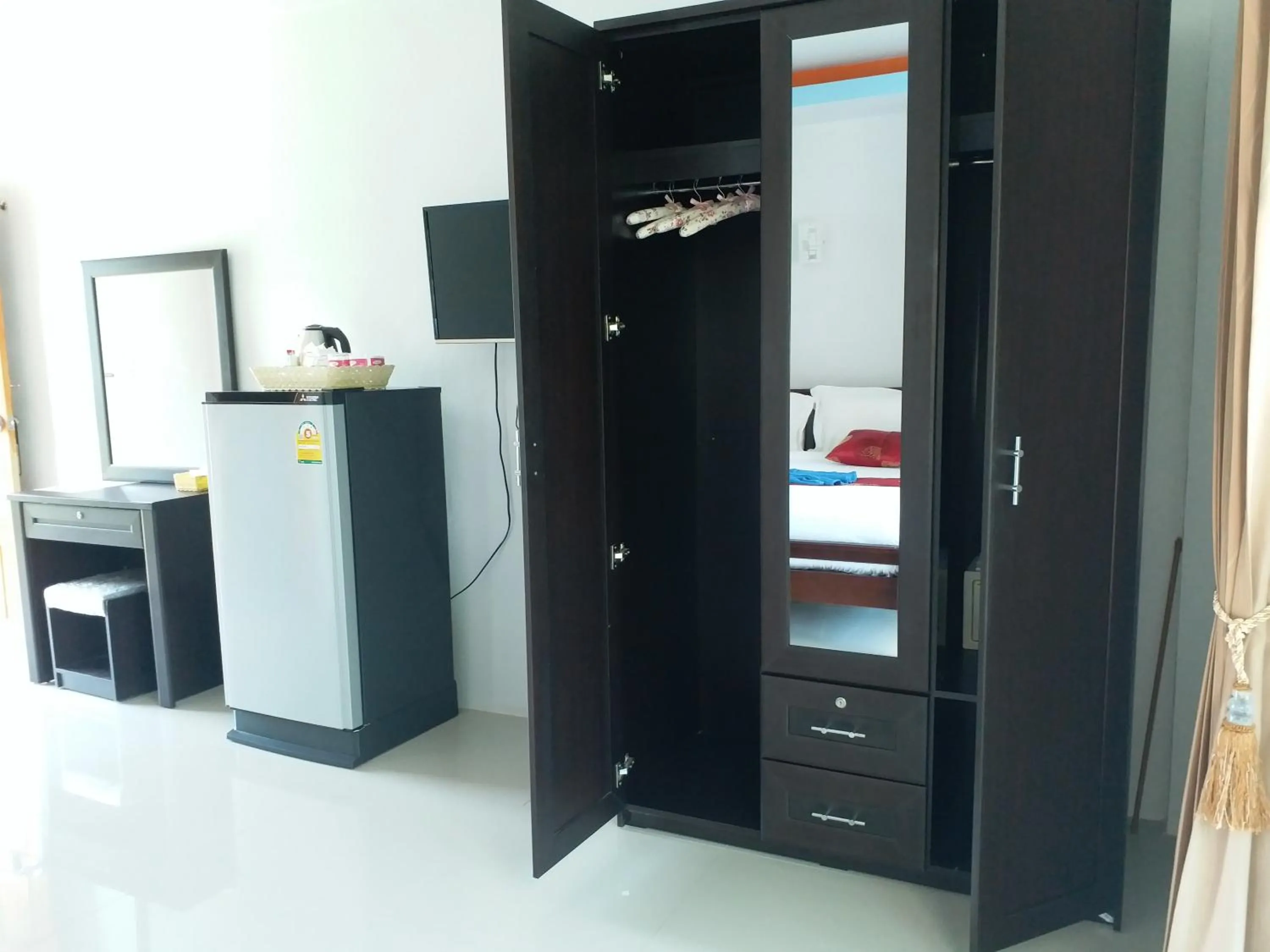 Bed in Tamarind Lanta Resort