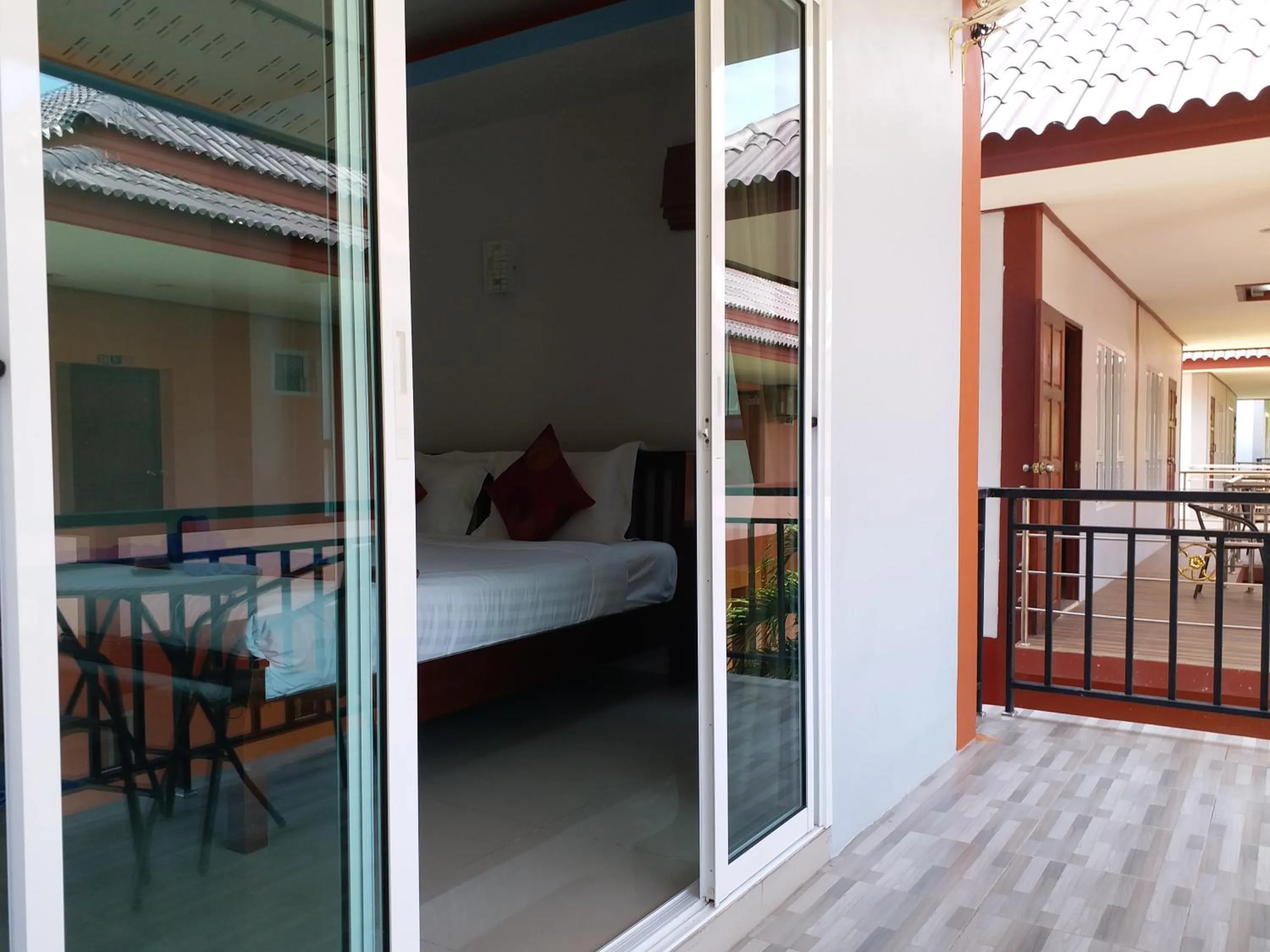 Bed in Tamarind Lanta Resort