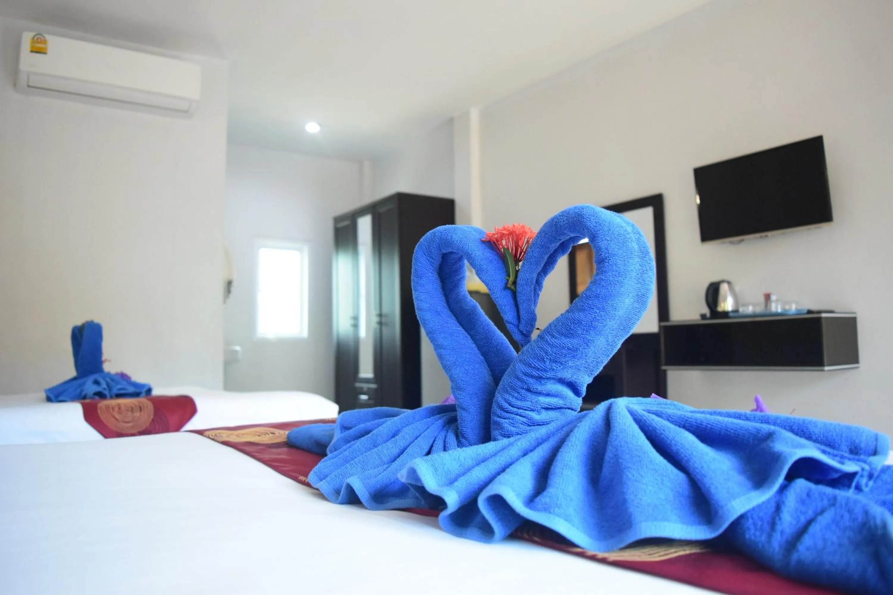 Bed in Tamarind Lanta Resort