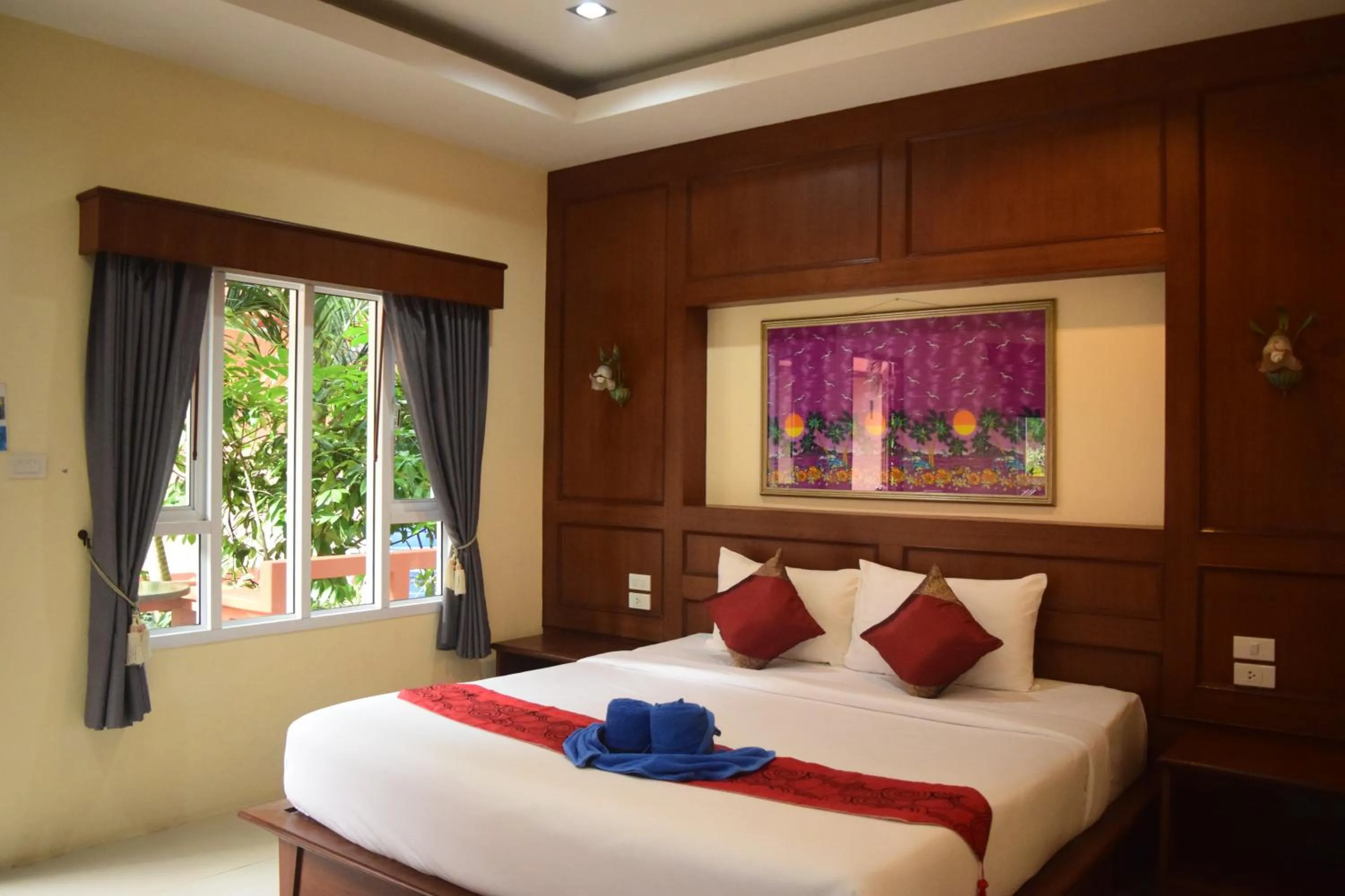 Bed in Tamarind Lanta Resort