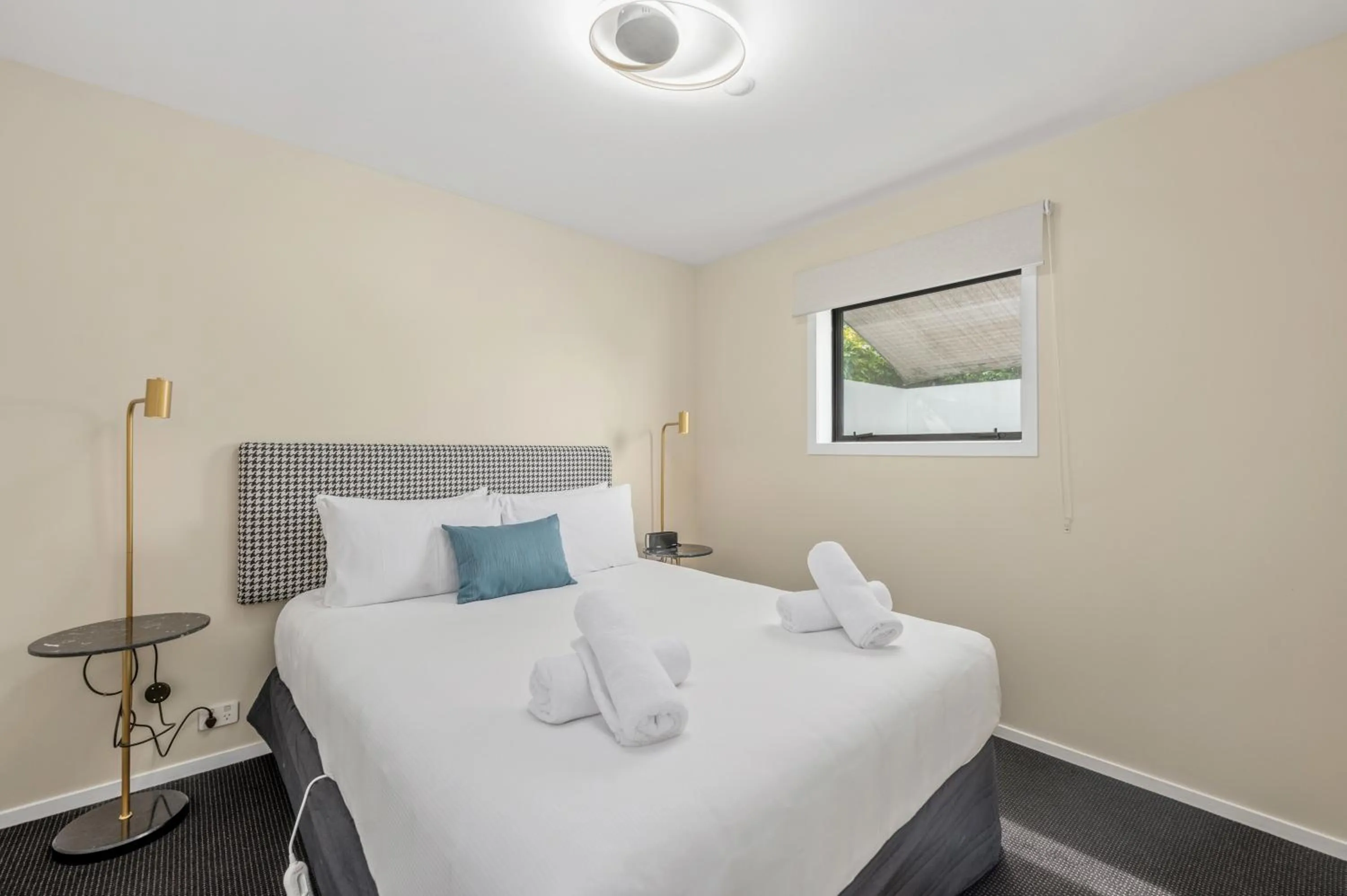 Bed in ASURE Rotorua International Motor Inn