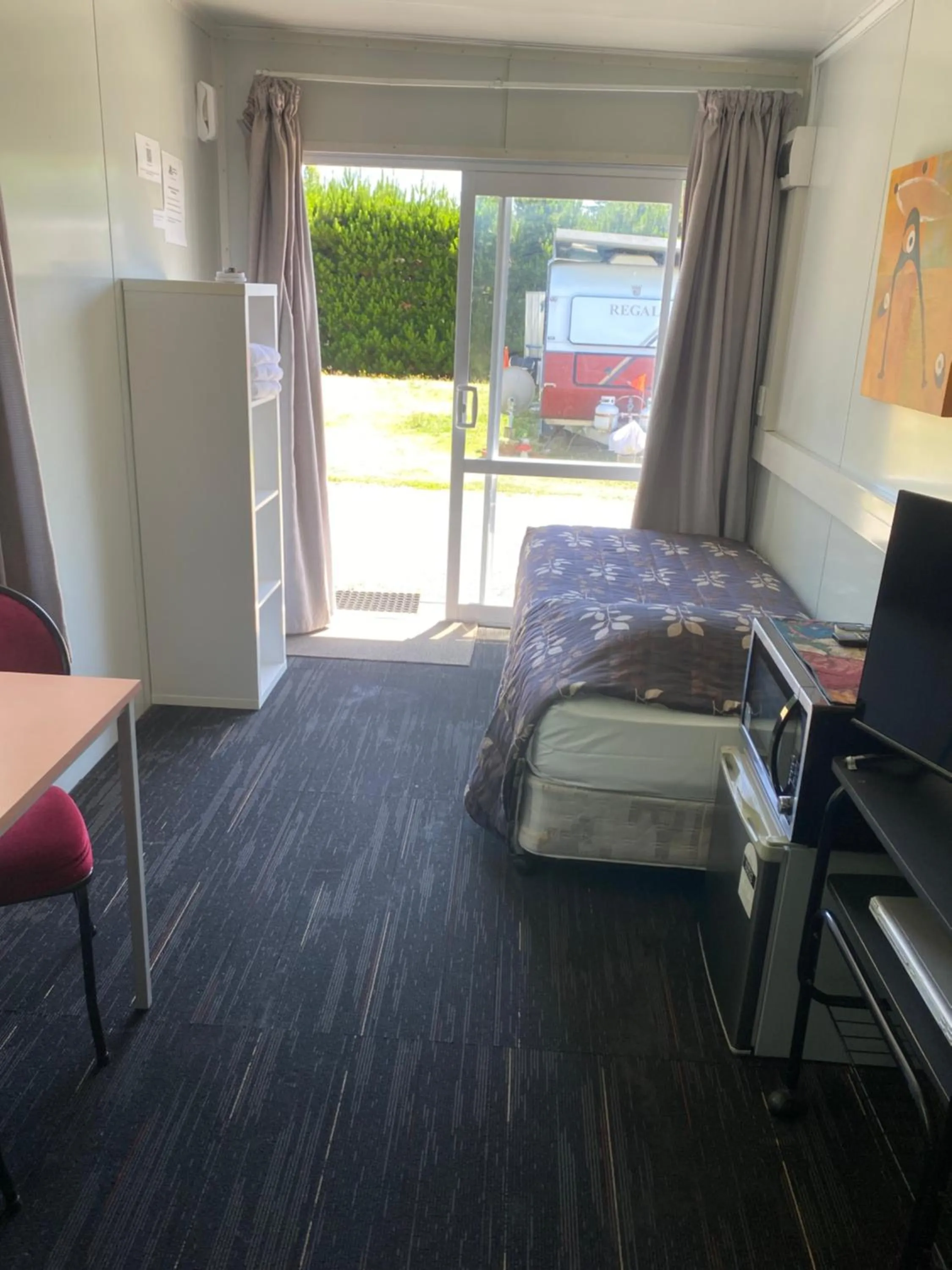 Bed in Rangiora Eco Holiday Park