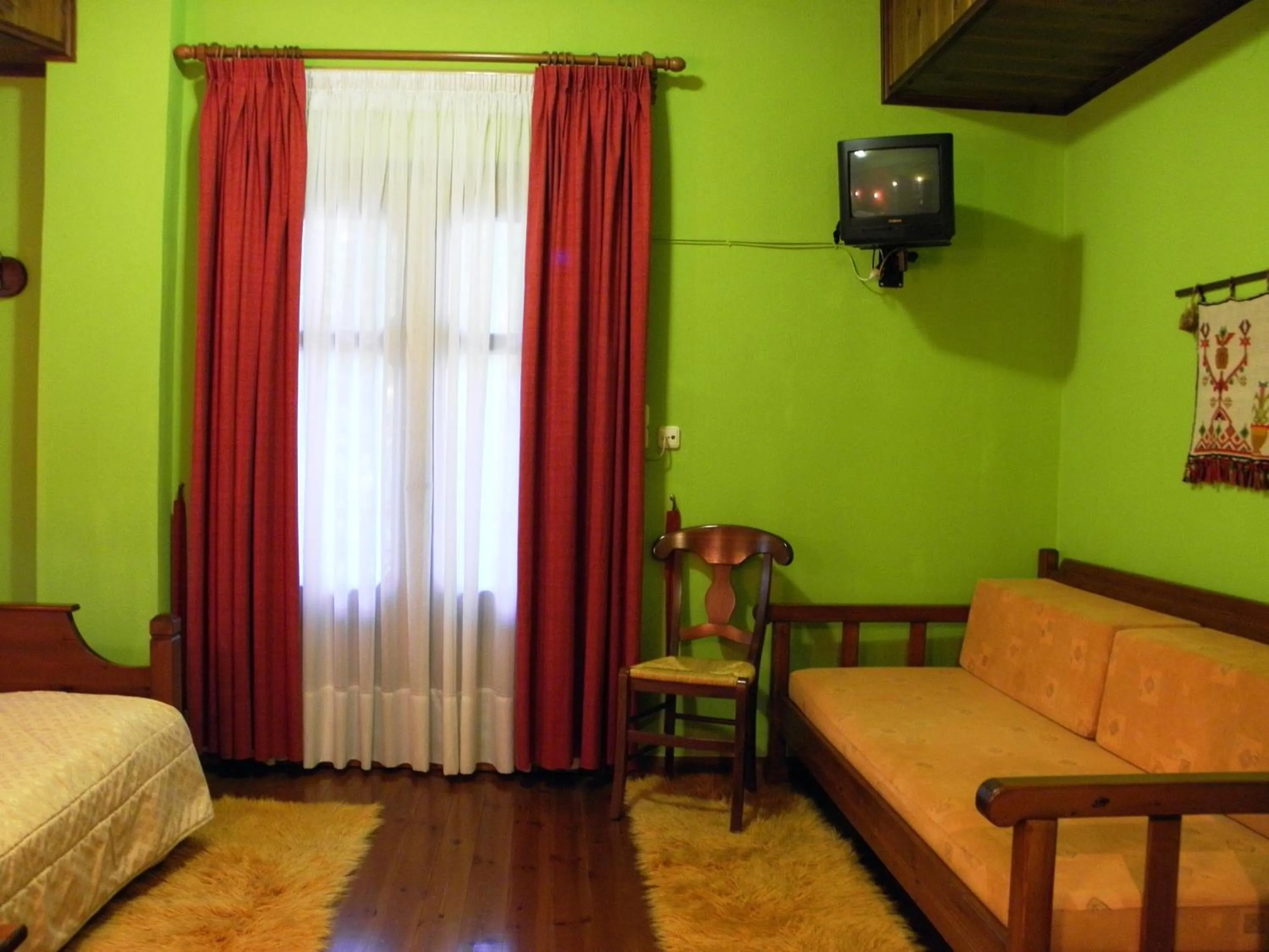 Photo of the whole room, Bed in Hotel Mpakou