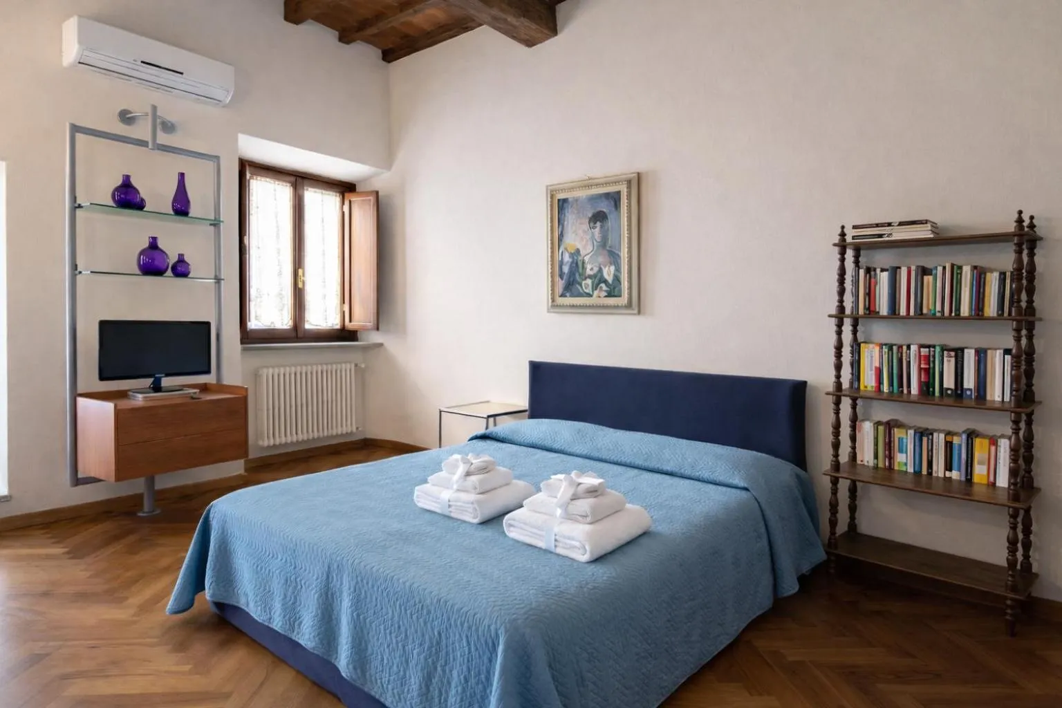 Bed in La Corte Del Re Suite & Rooms Arezzo