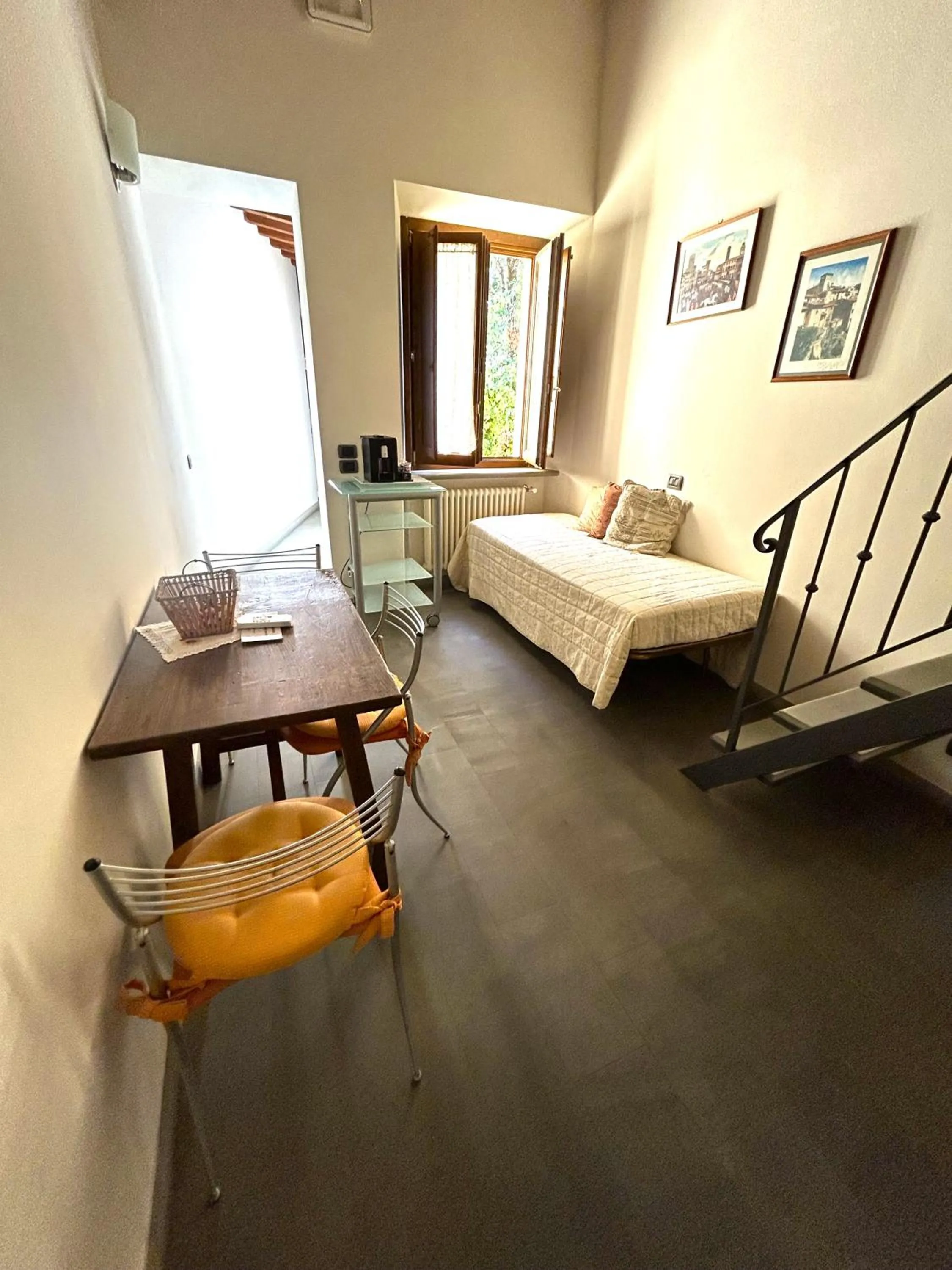 Dining area, Bed in La Corte Del Re Suite & Rooms Arezzo