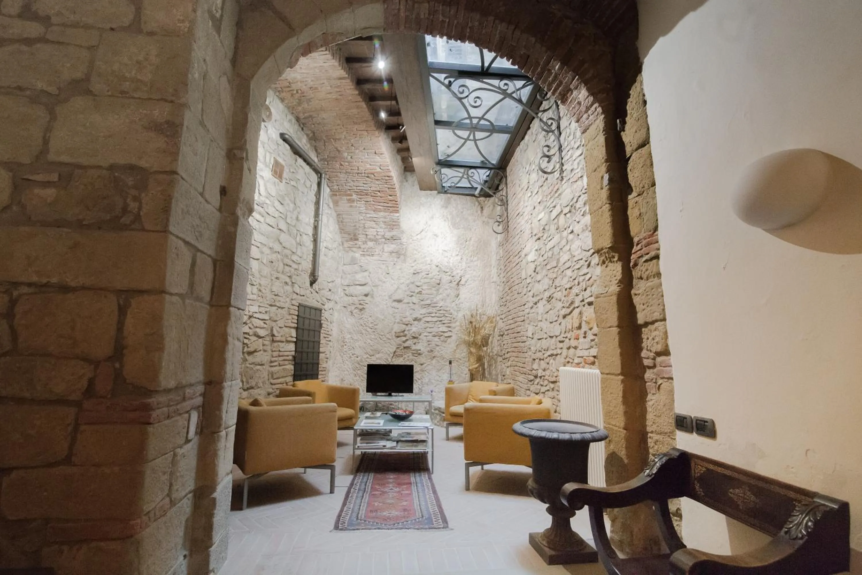 Lobby or reception in La Corte Del Re Suite & Rooms Arezzo