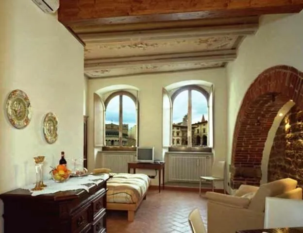 Bed in La Corte Del Re Suite & Rooms Arezzo
