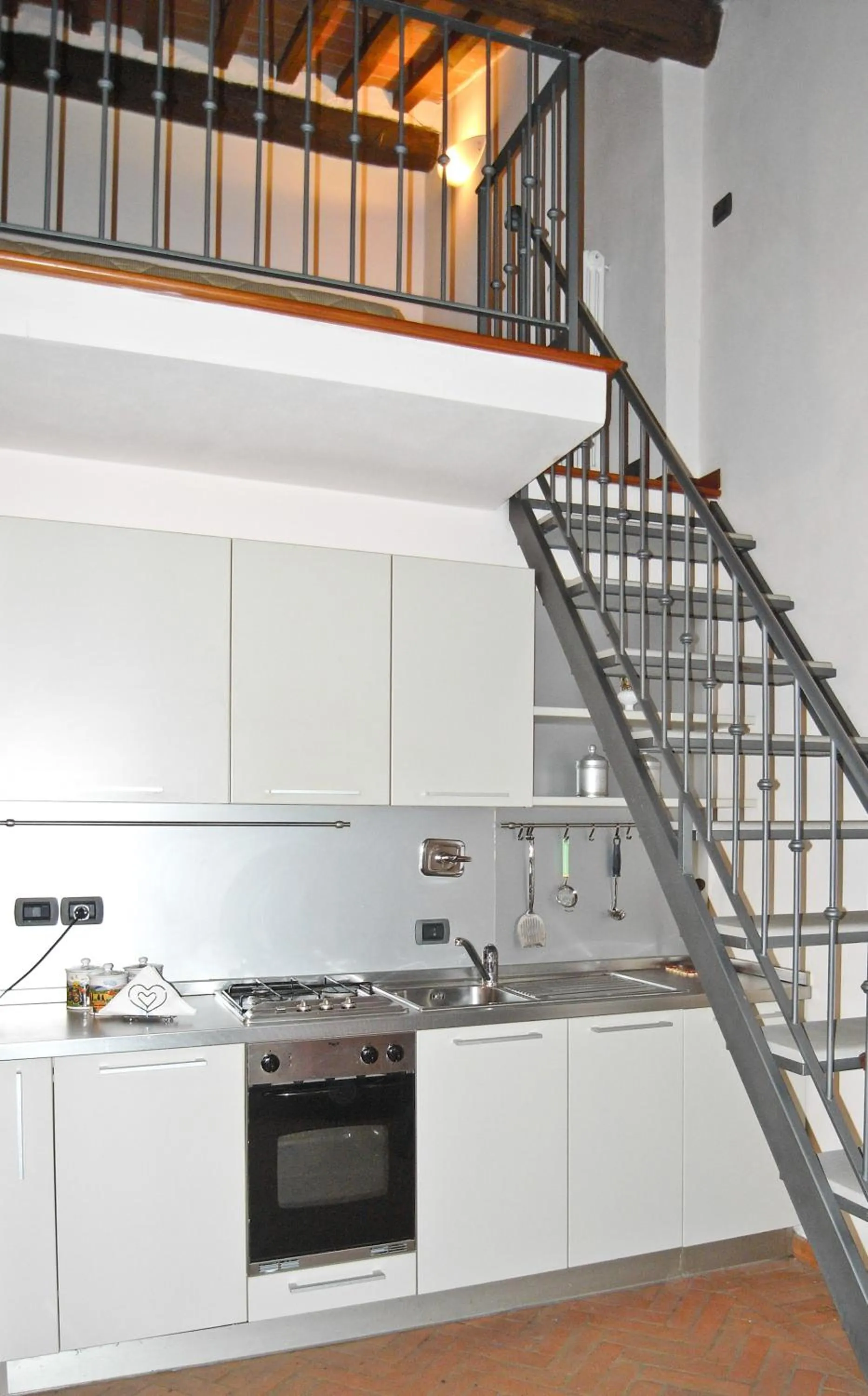 Kitchen or kitchenette in La Corte Del Re Suite & Rooms Arezzo