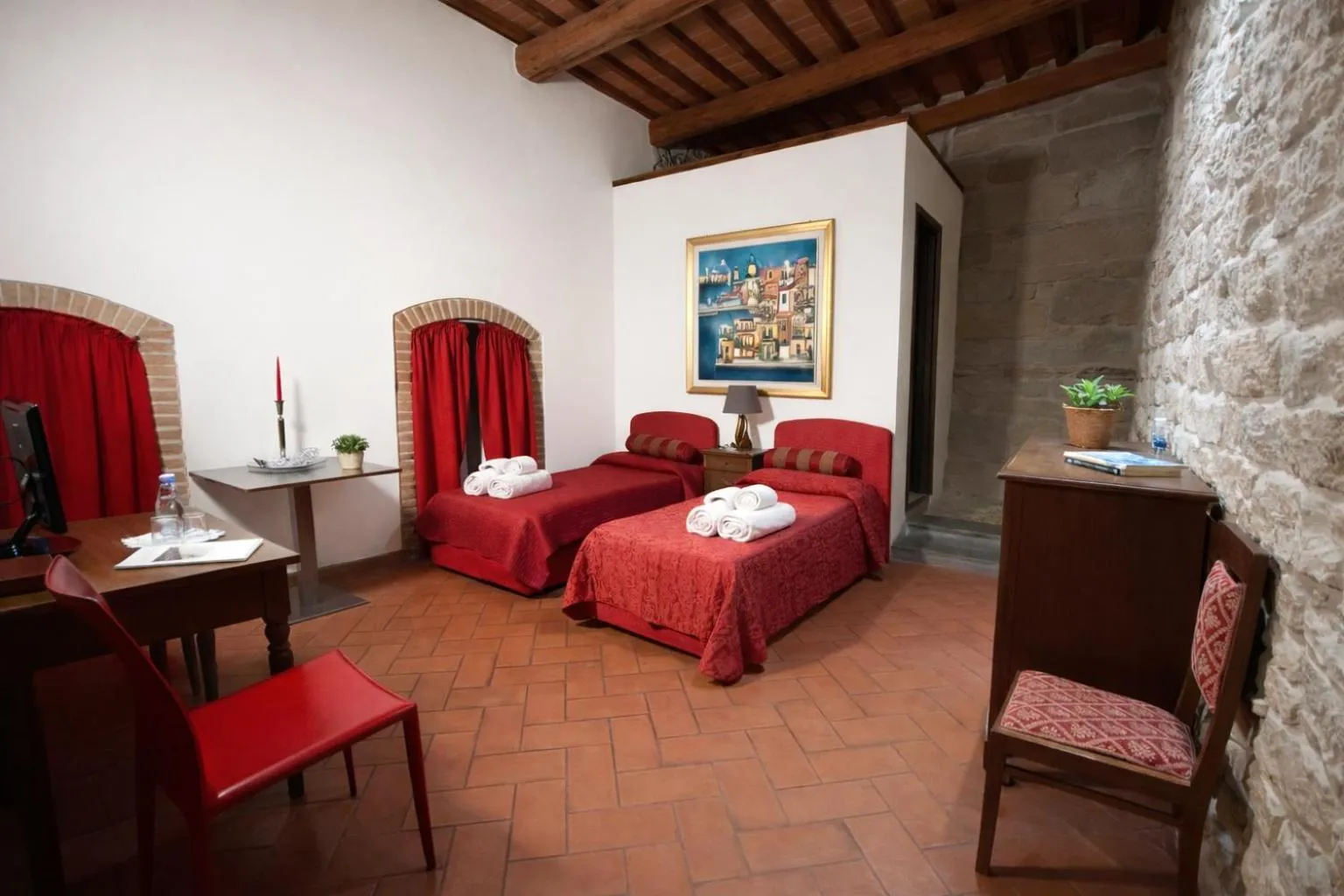 Bed in La Corte Del Re Suite & Rooms Arezzo