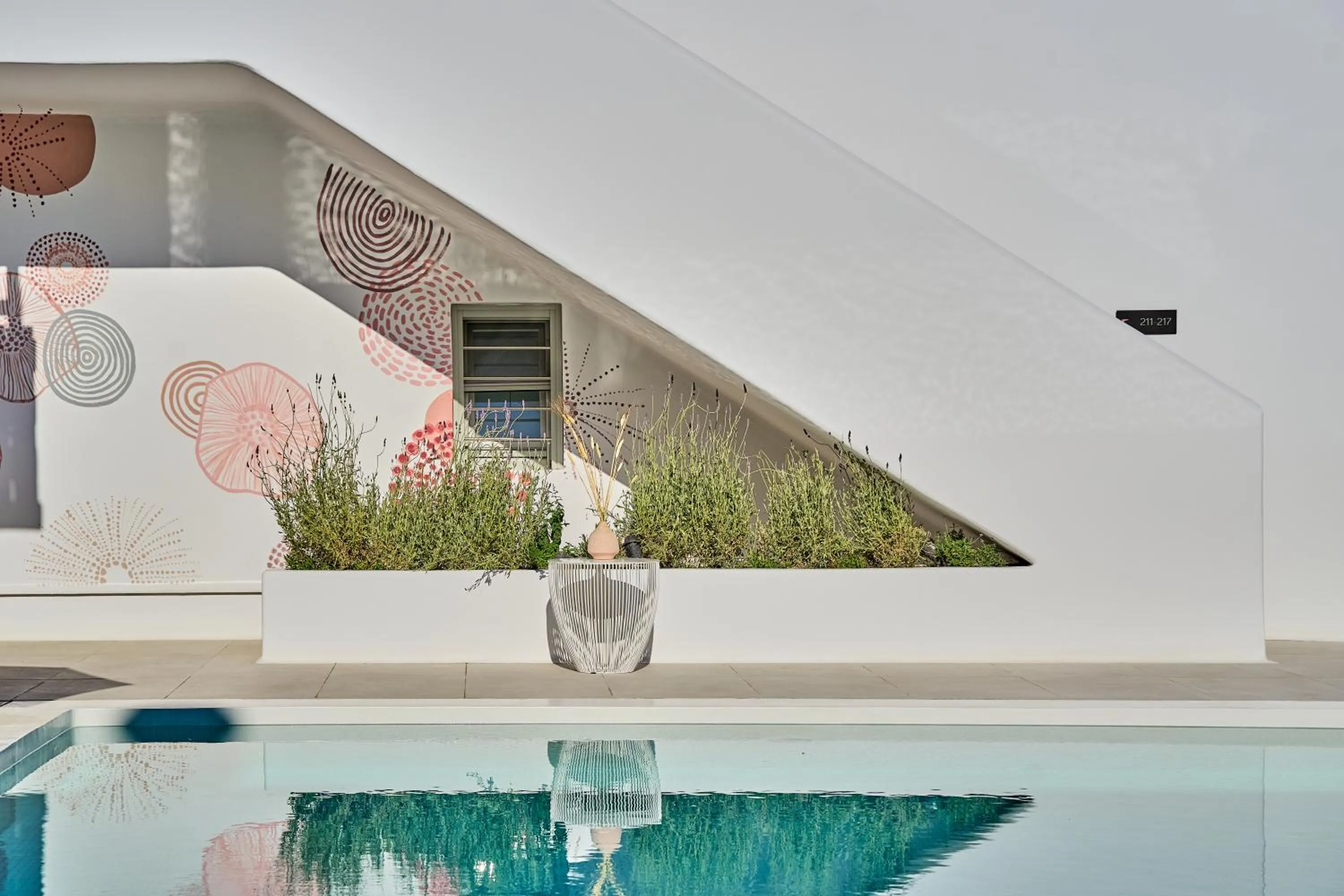 Swimming pool in Adorno Beach Hotel and Suites