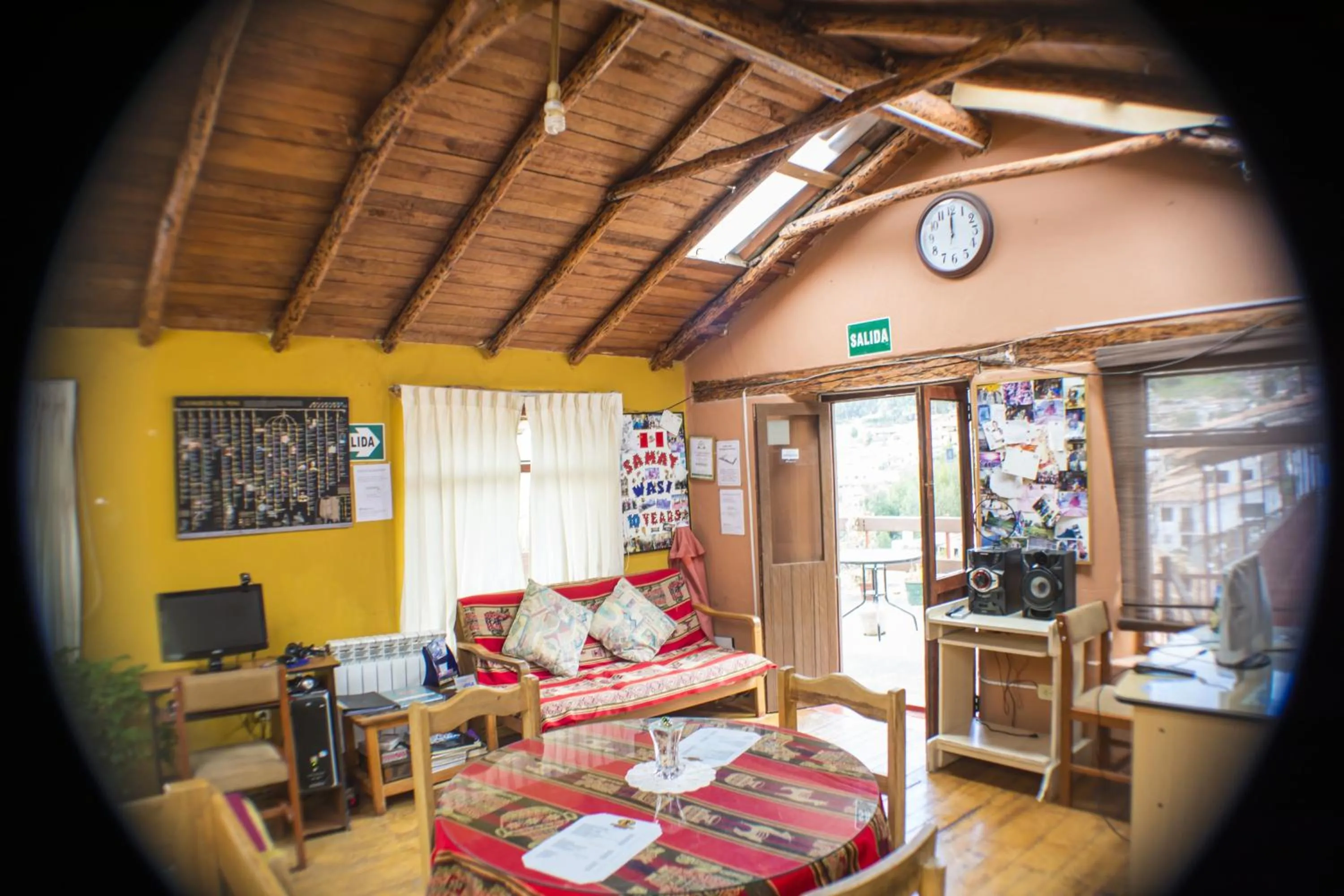 Communal lounge/ TV room in Samay Wasi Hostel