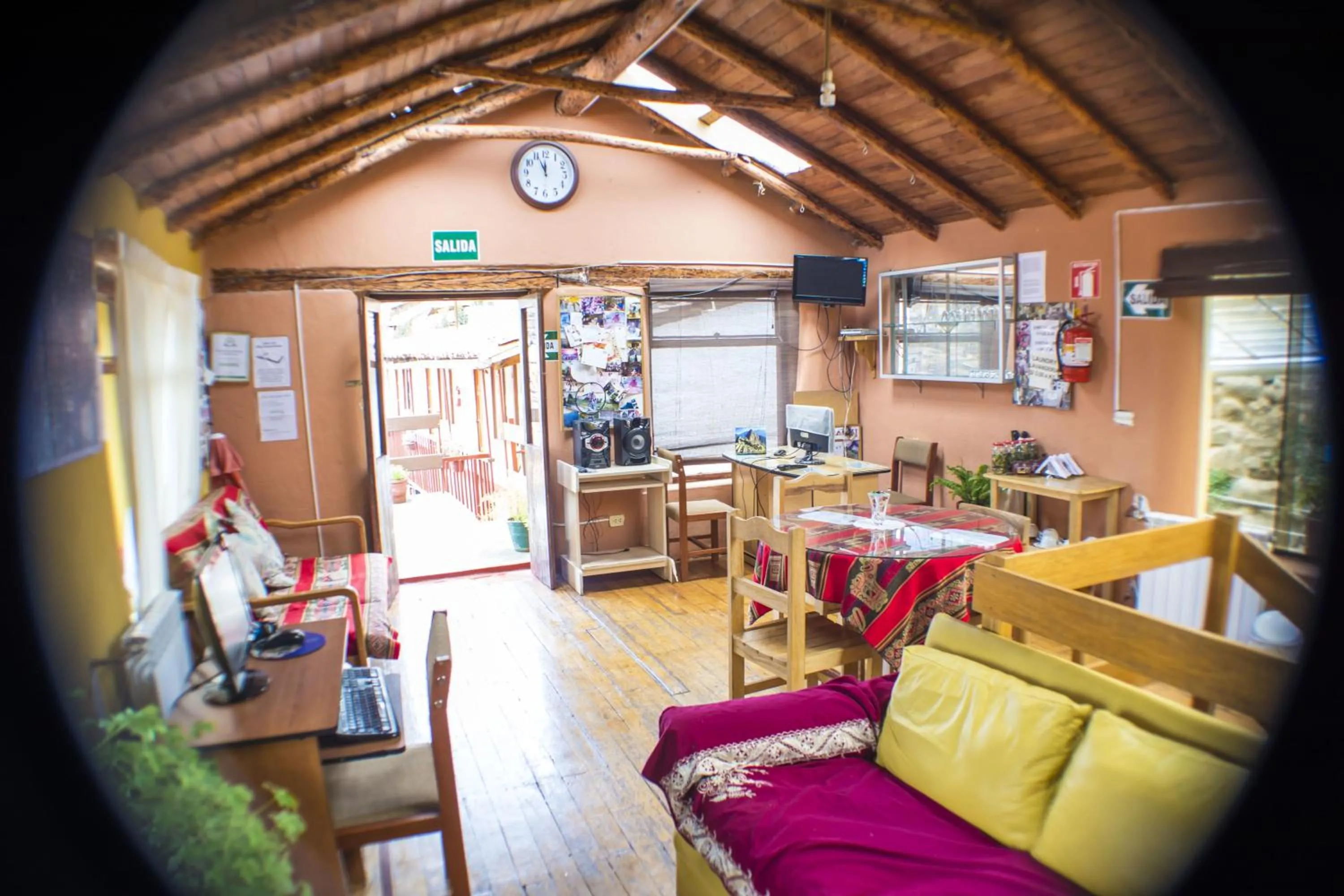 Communal lounge/ TV room in Samay Wasi Hostel