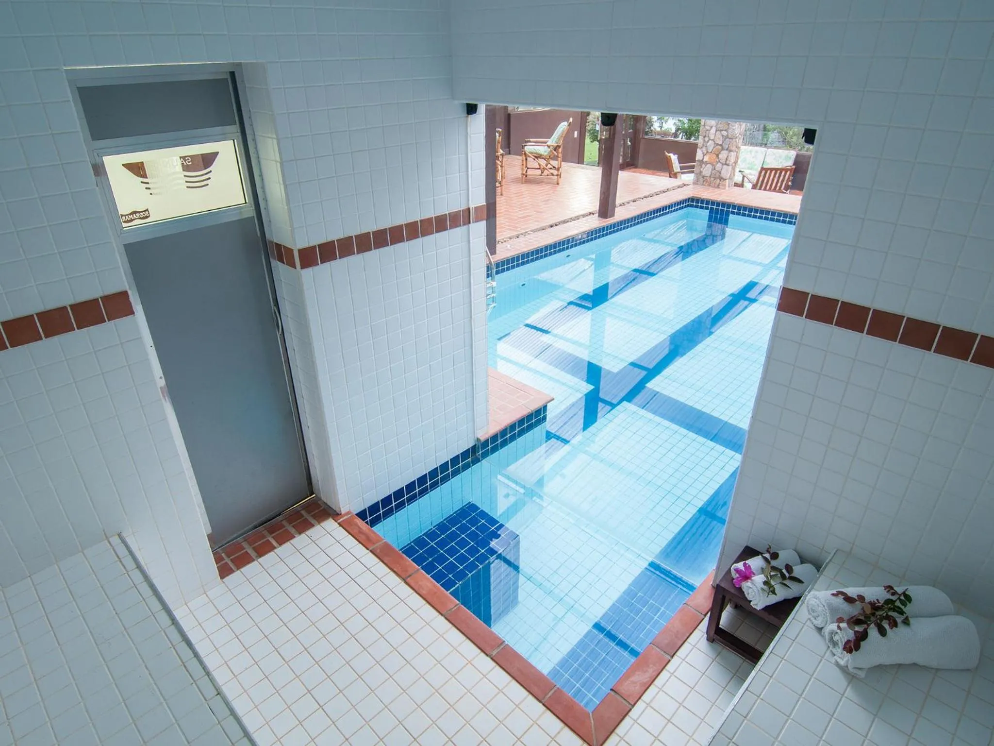 Swimming pool in Pousada Jardim das Montanhas