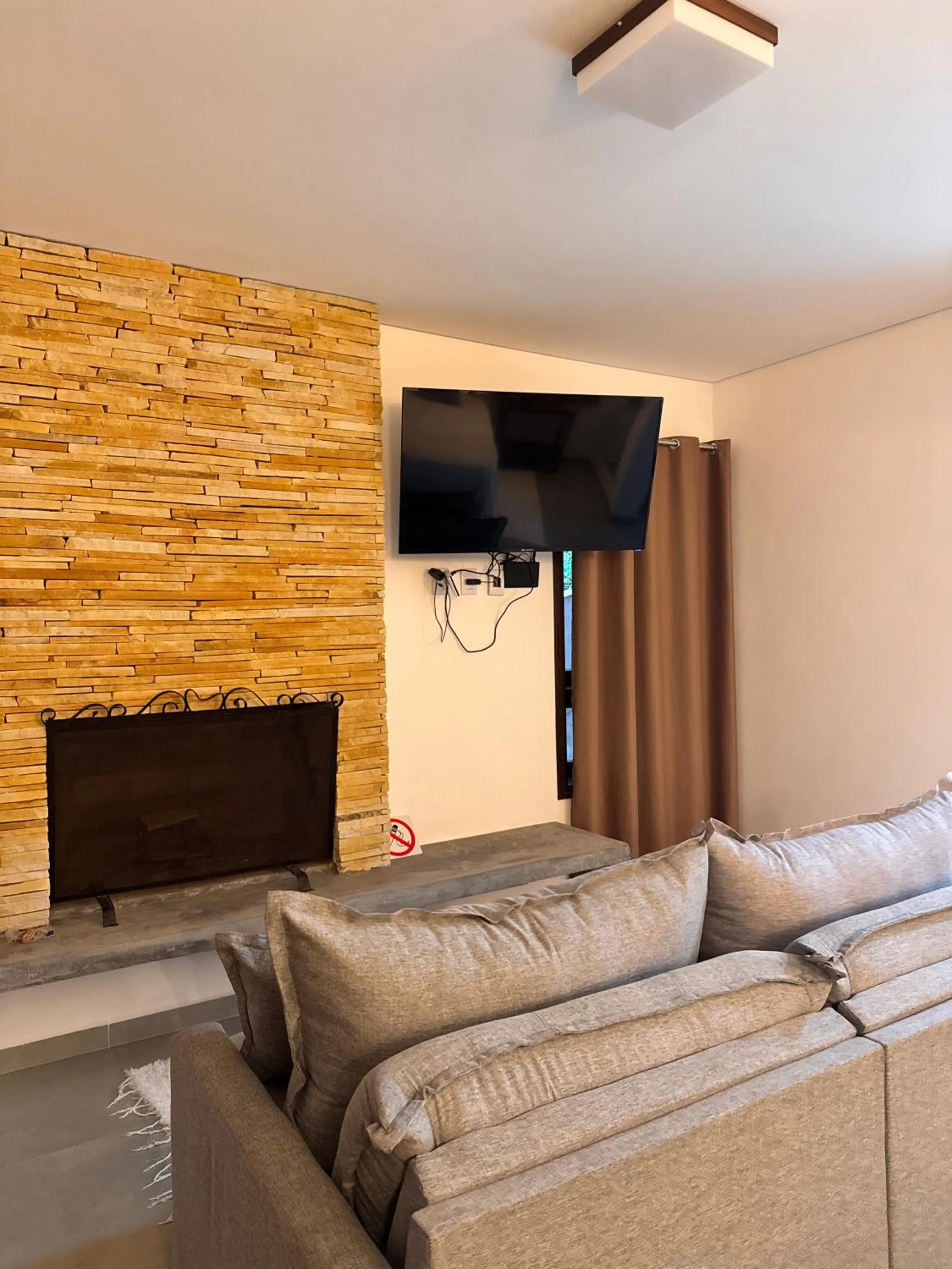 Living room in Pousada Jardim das Montanhas