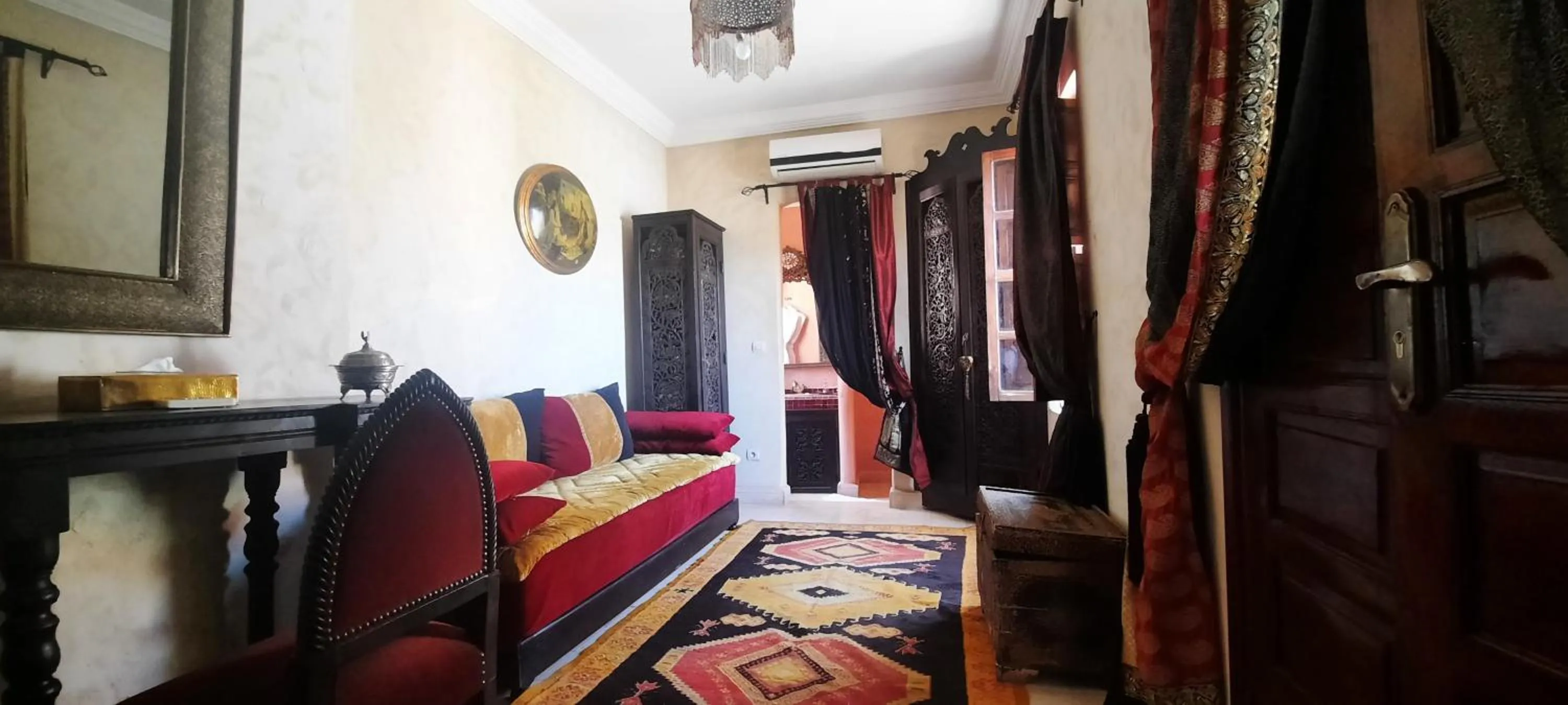 Seating area, Bed in Riad Lorsya