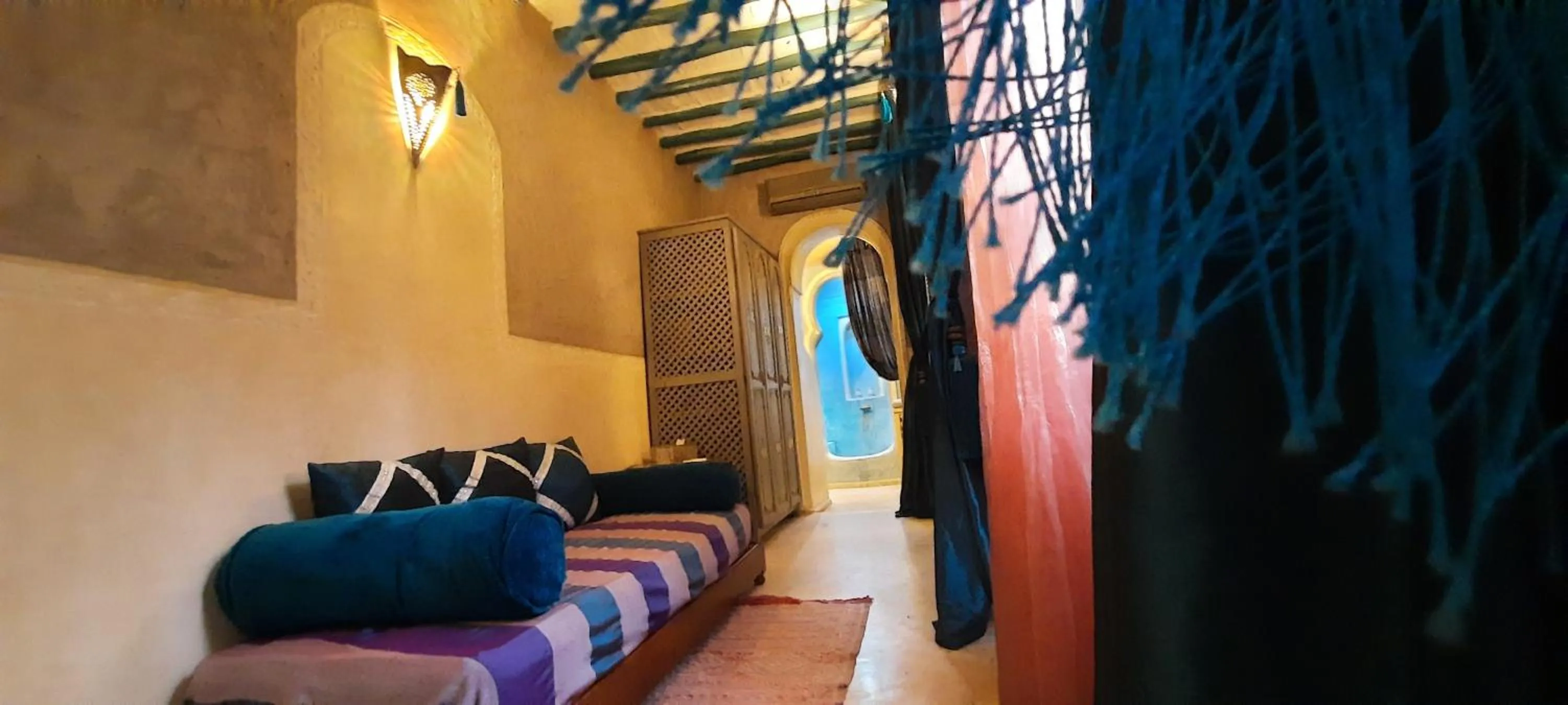 Seating area, Bed in Riad Lorsya