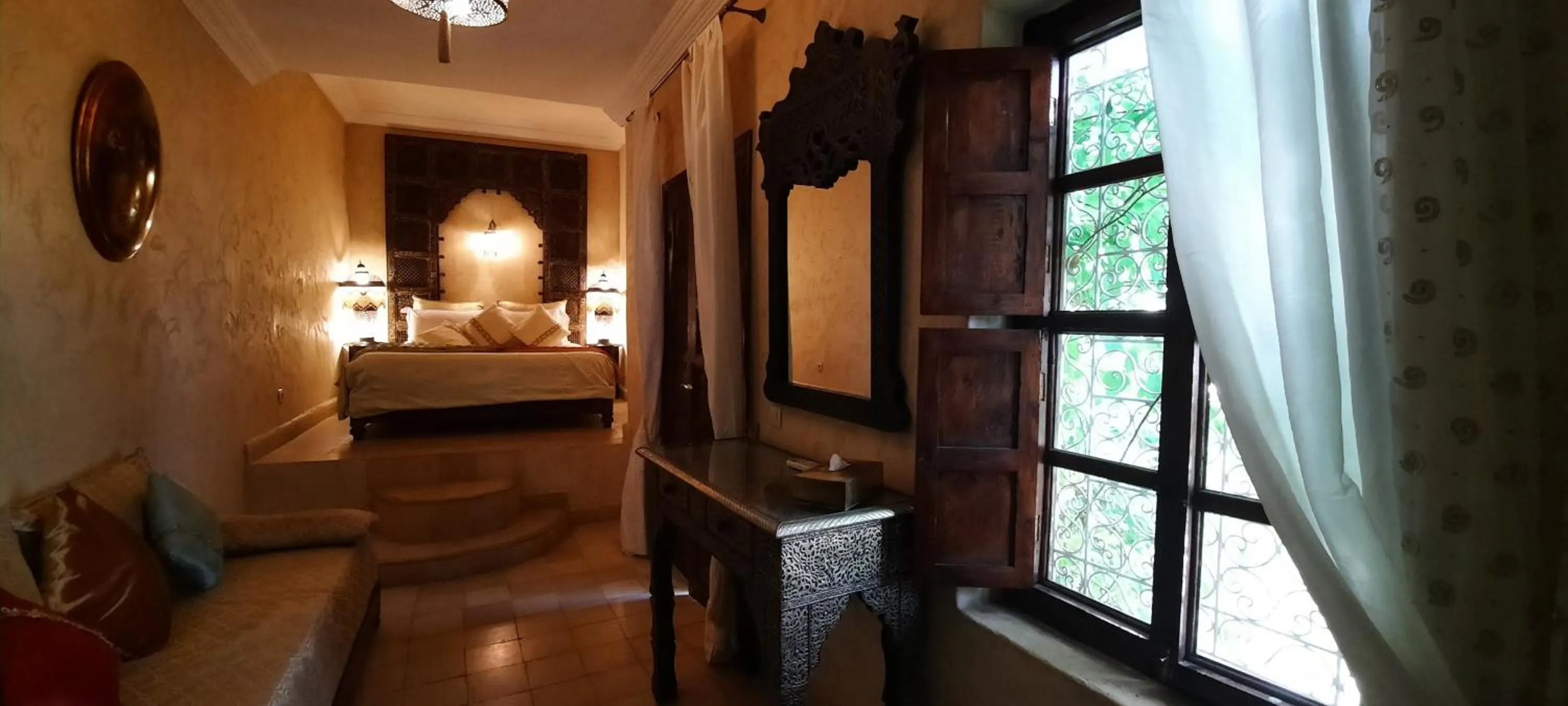 Living room, Bed in Riad Lorsya