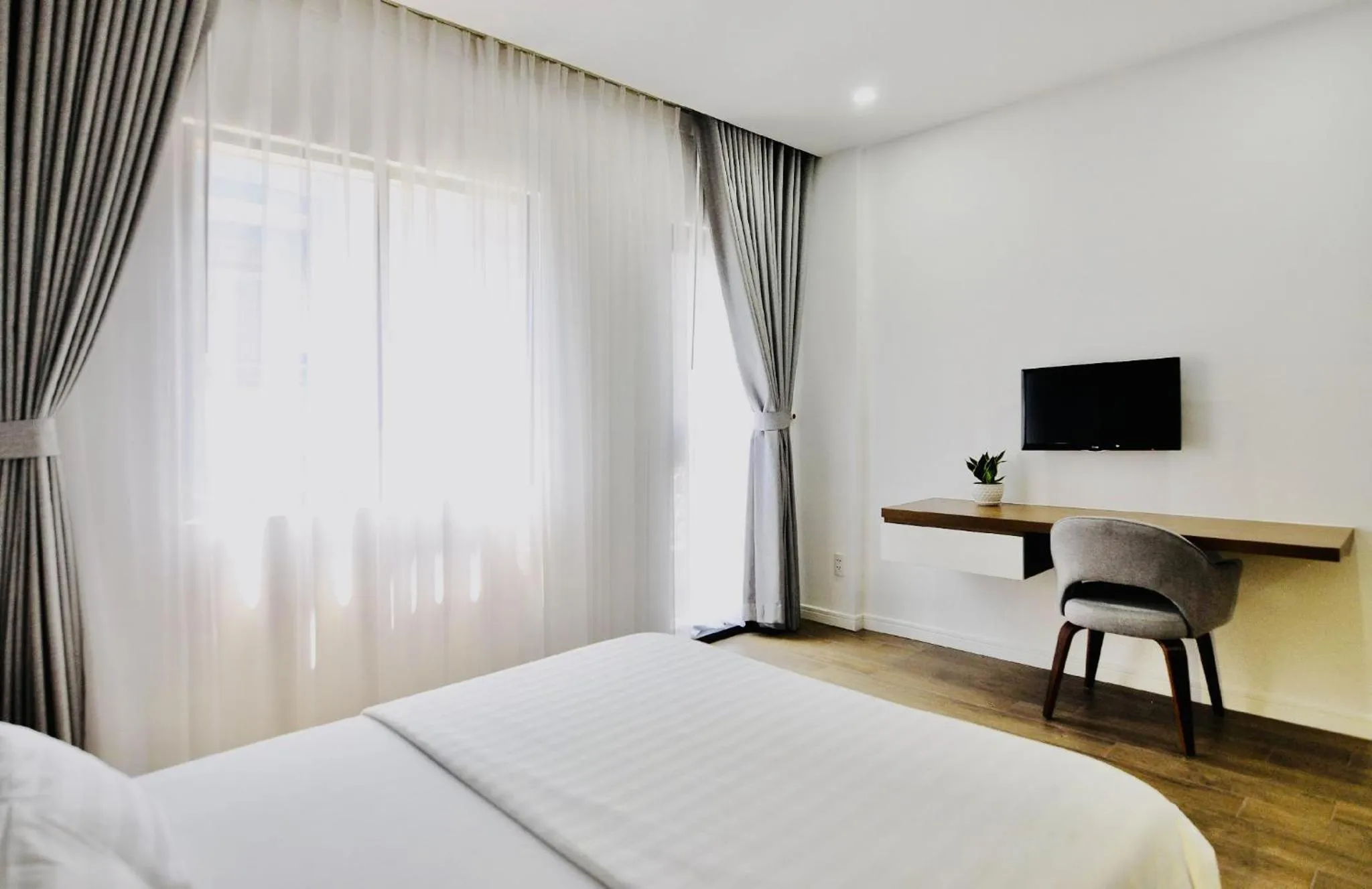 Bed in Royal Dragon Boutique Hotel