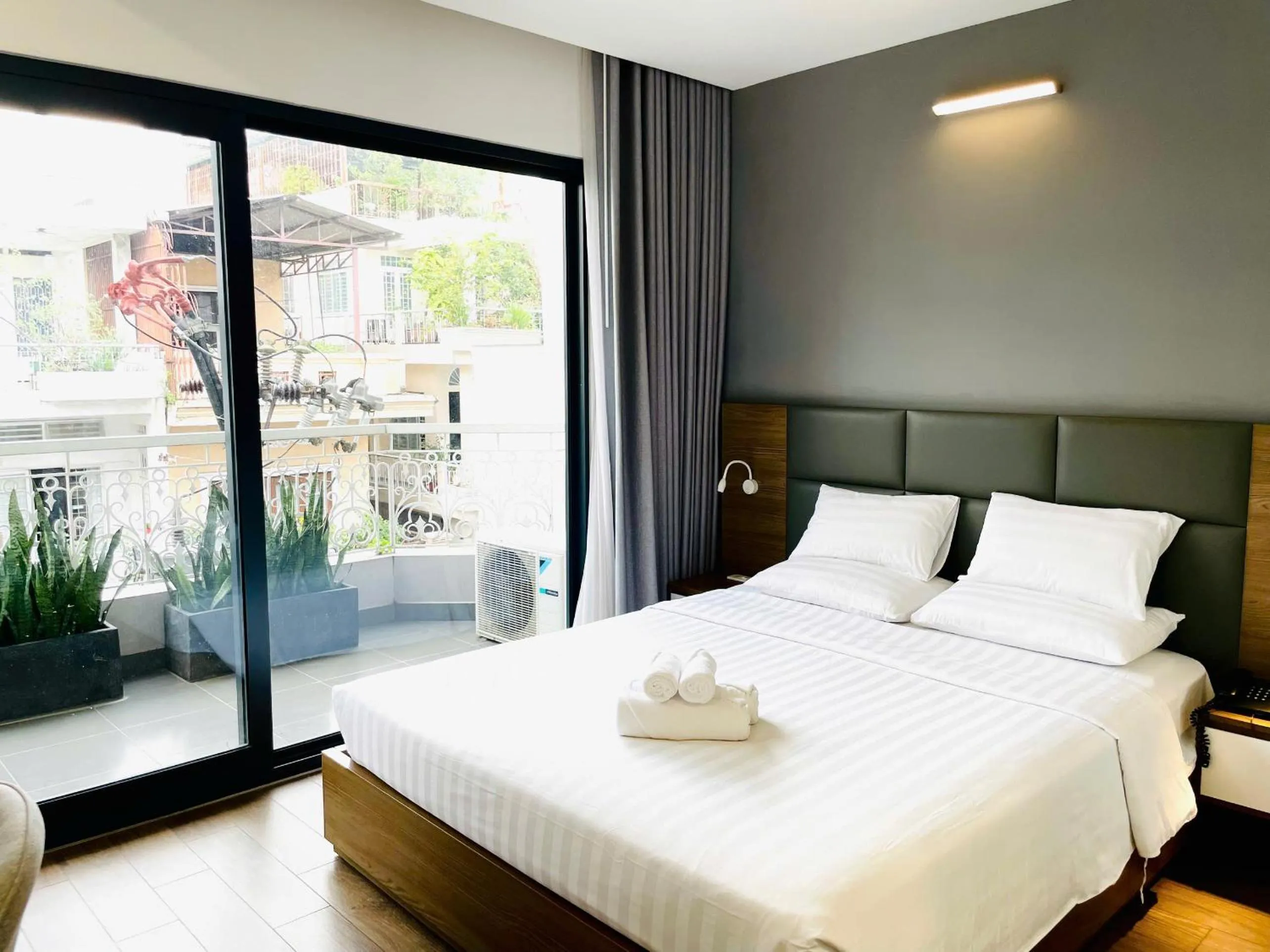 Bed in Royal Dragon Boutique Hotel