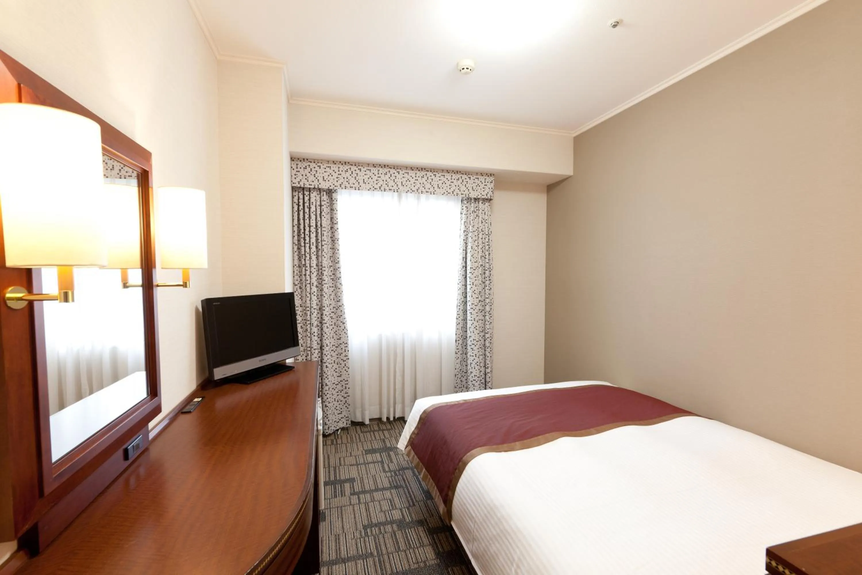 Bed in Hotel Hokke Club Kagoshima