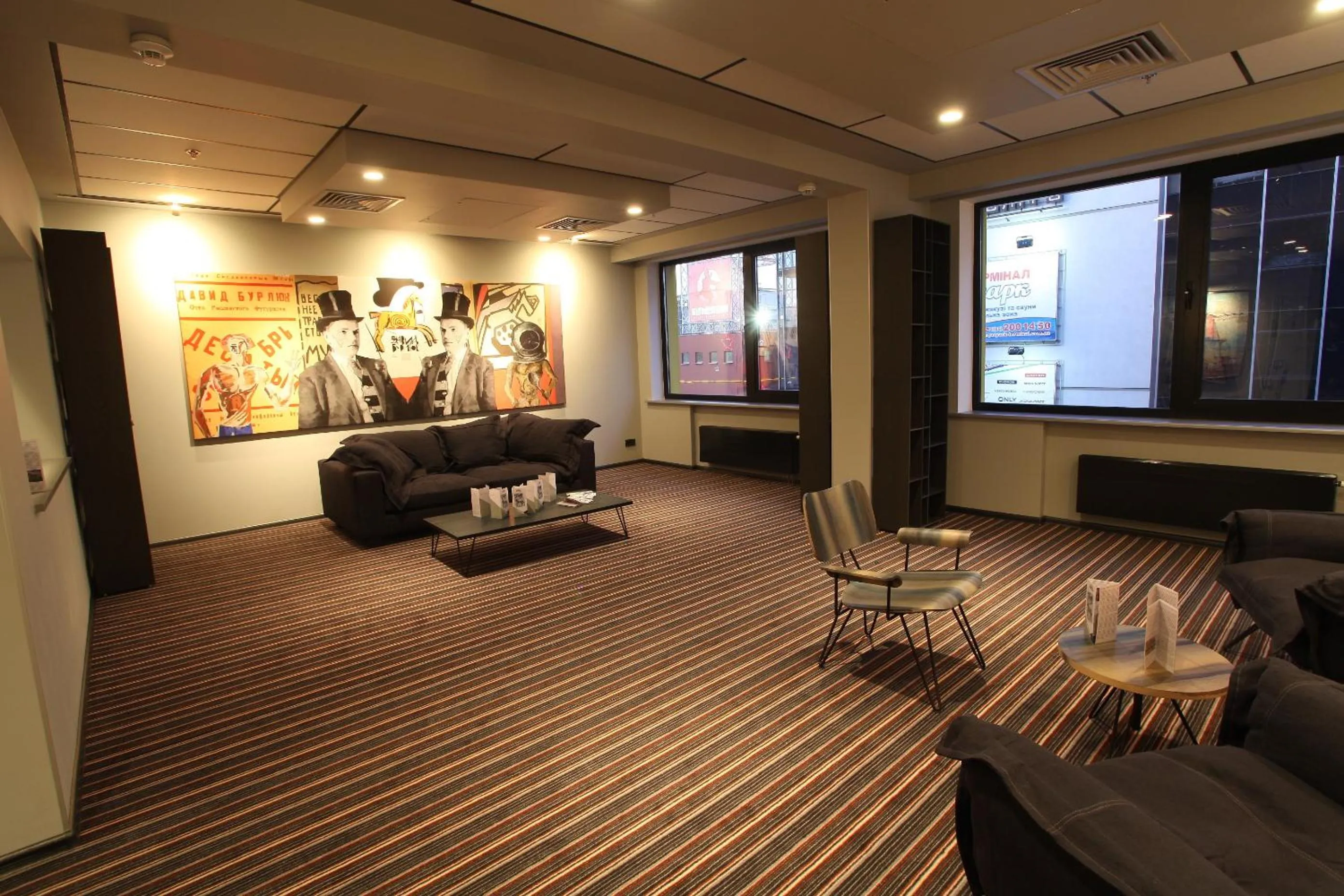 Communal lounge/ TV room in Mercure Kyiv Congress