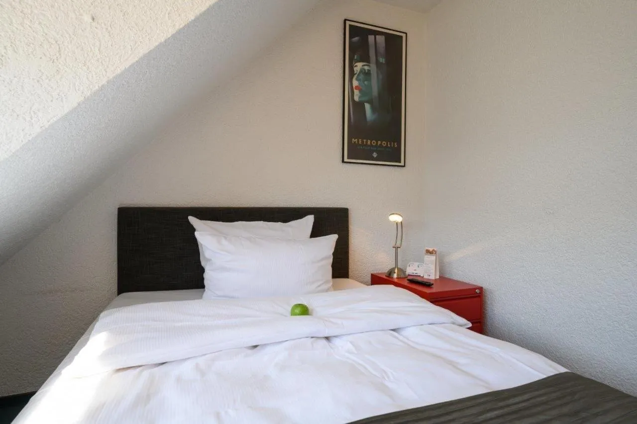 Bed in Hotel Heymann