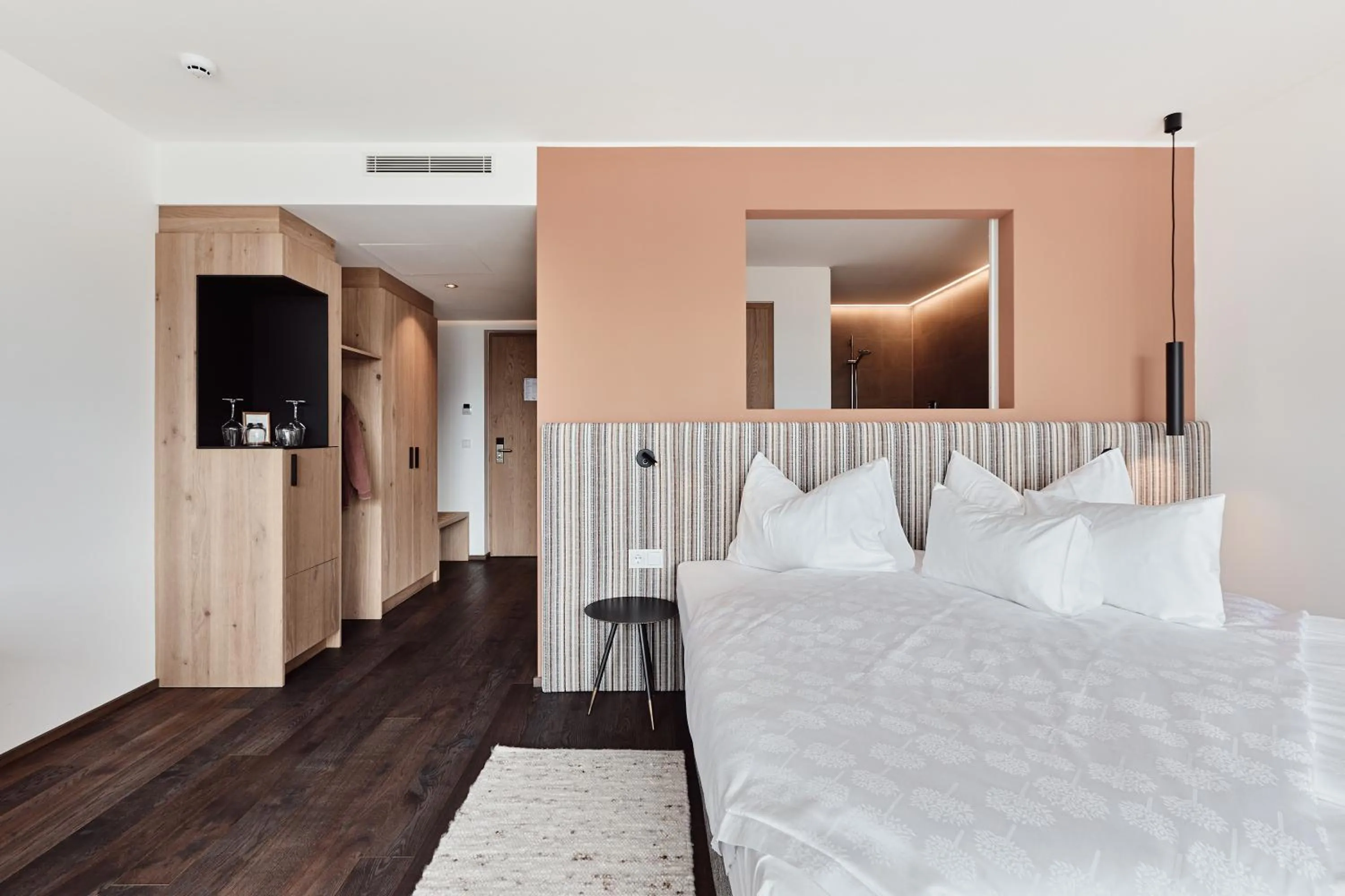 Bed in Haller Suites & Restaurant