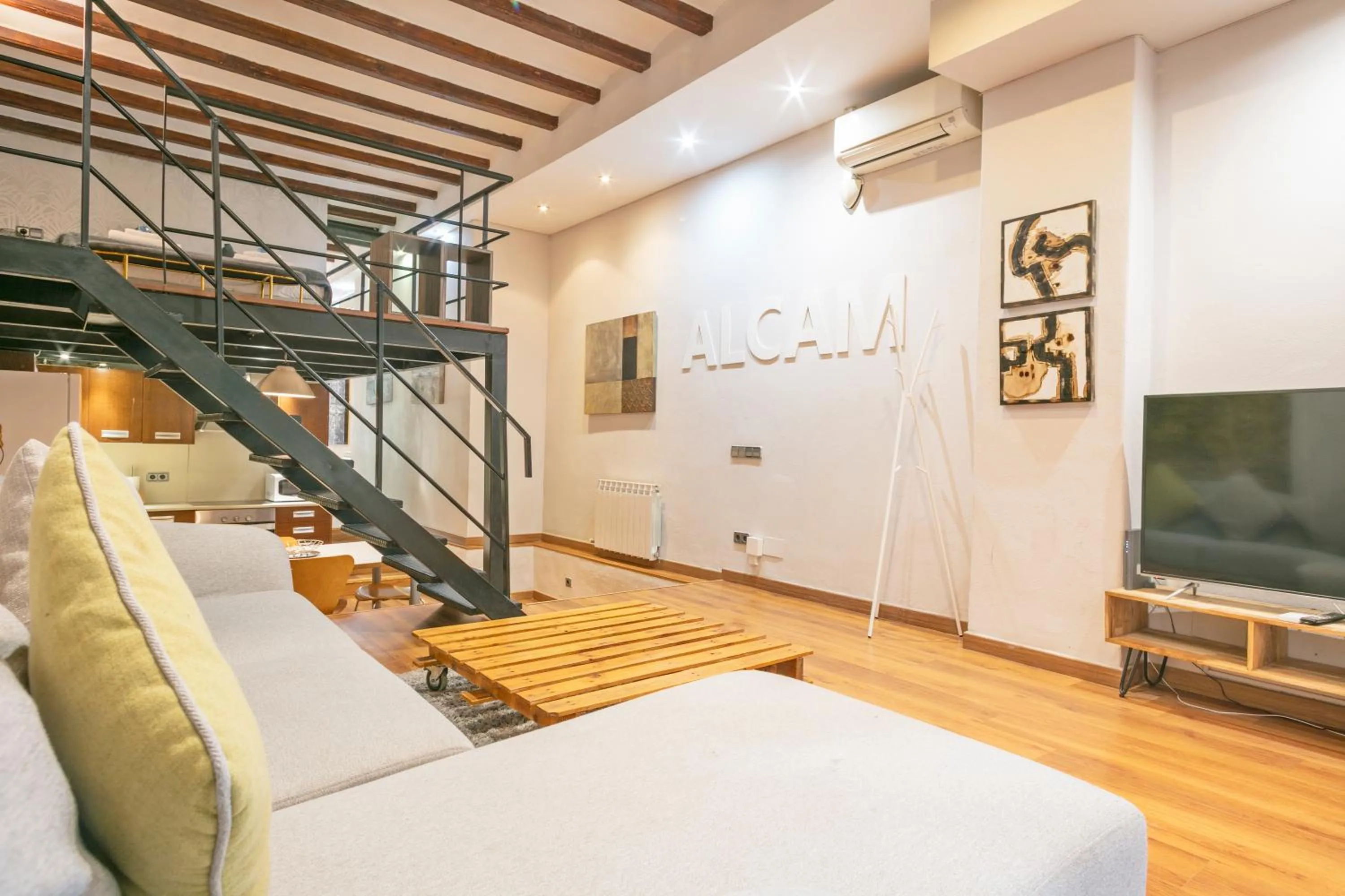 Living room in Alcam Loft Grassot