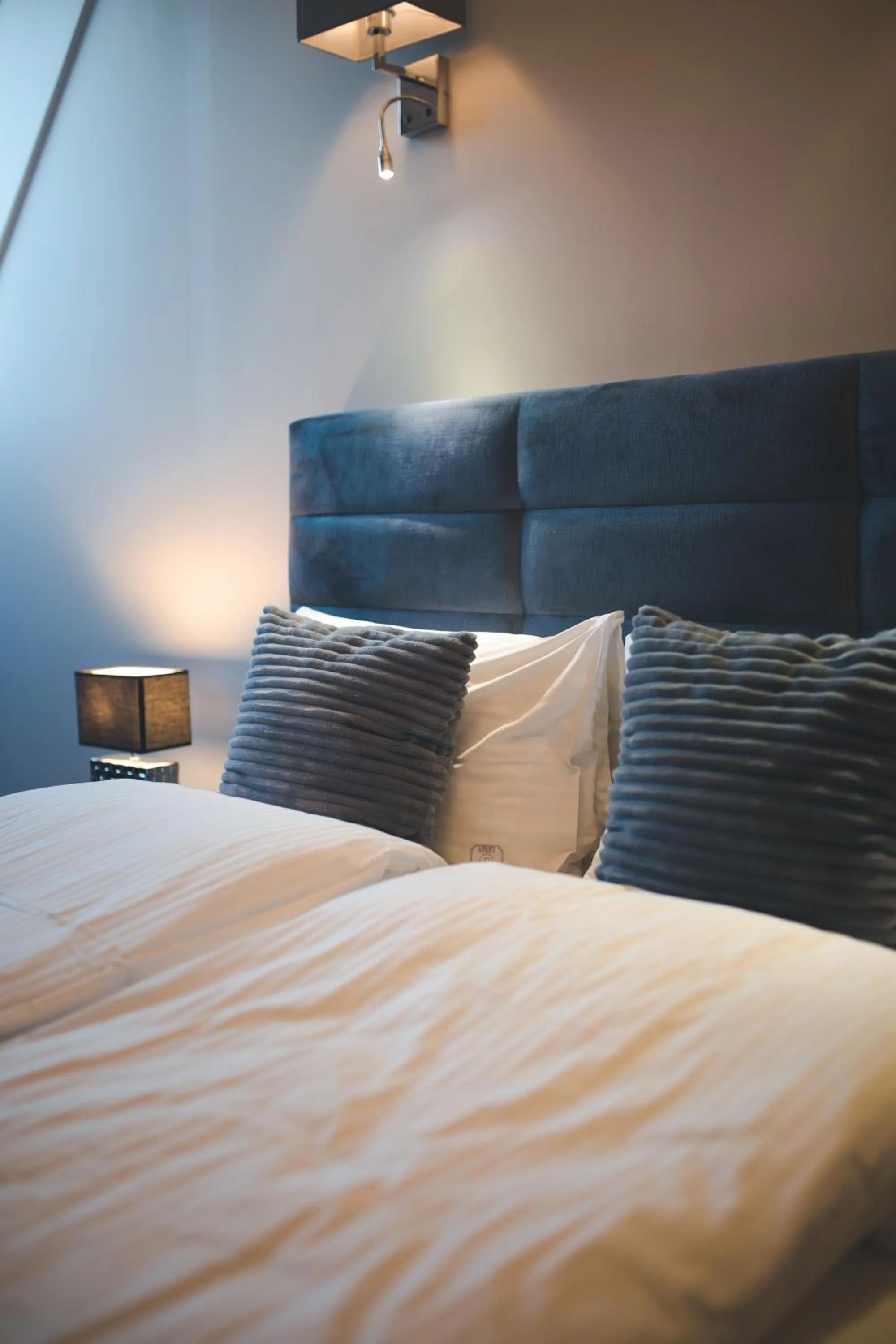 Bed in Aparthotel New Lux