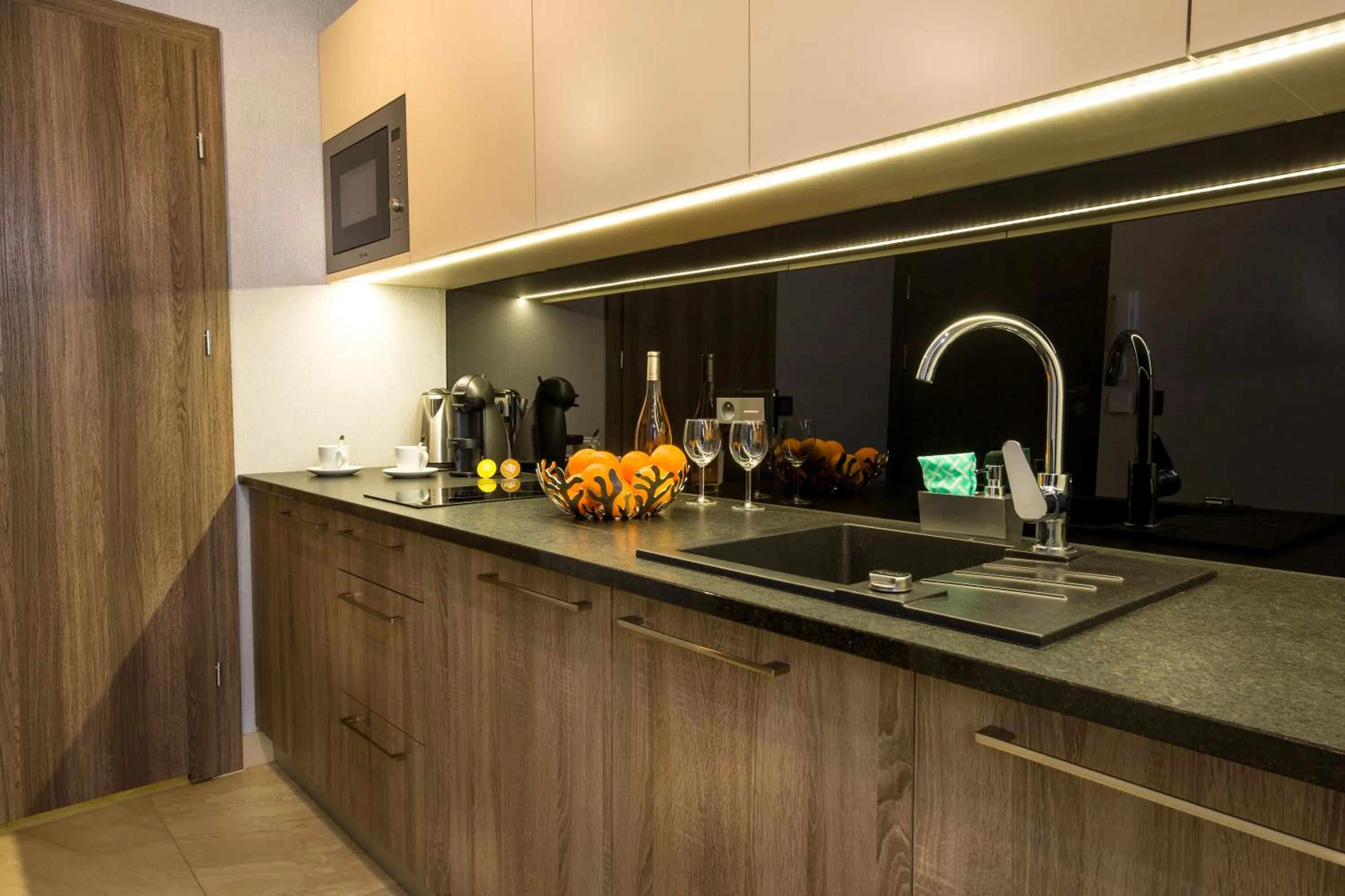 Kitchen or kitchenette in Aparthotel New Lux