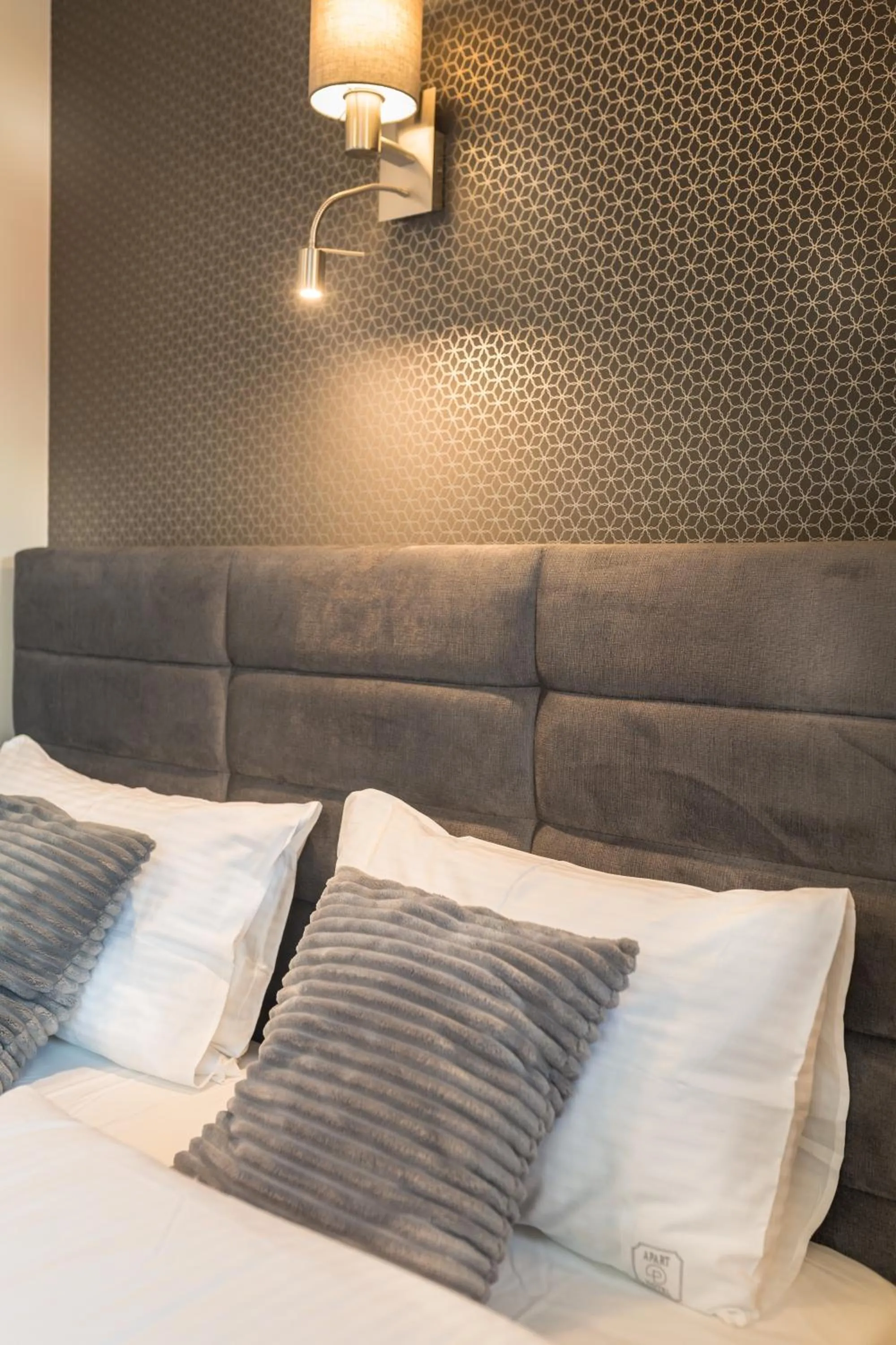 Bed in Aparthotel New Lux