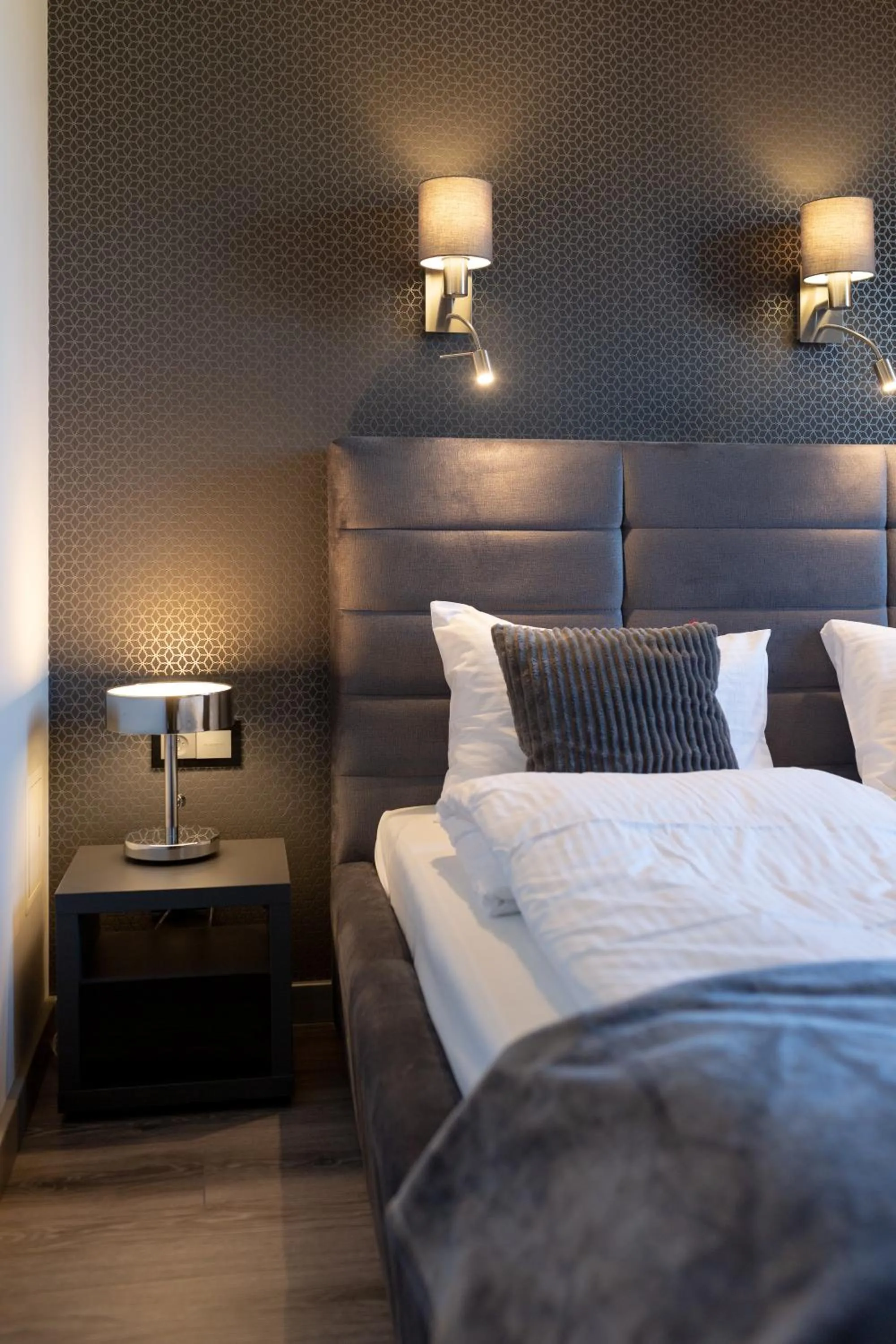 Bed in Aparthotel New Lux