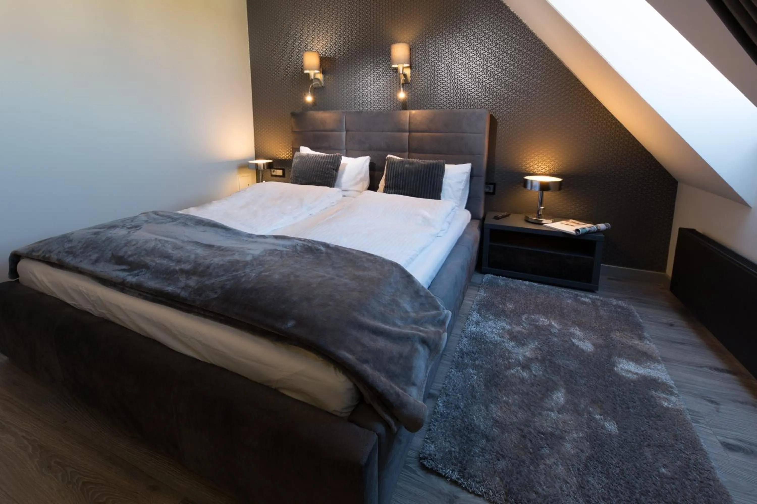 Bed in Aparthotel New Lux