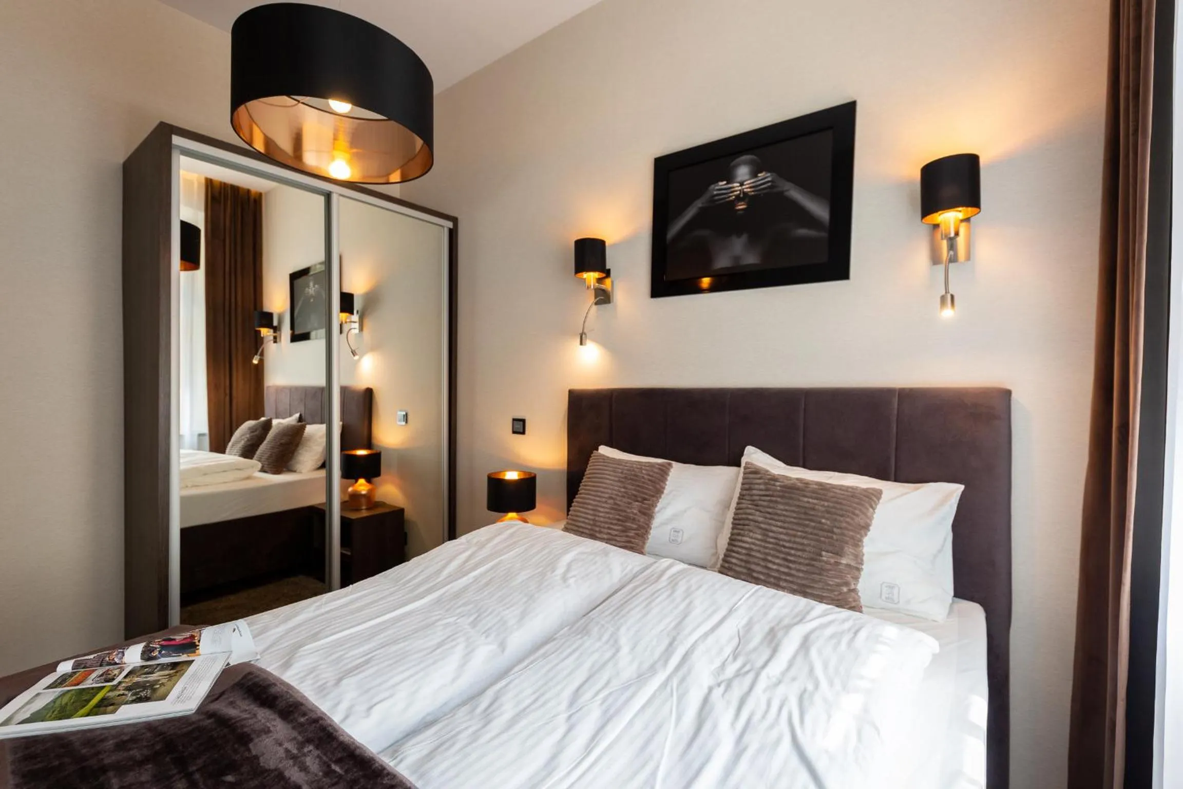 Bed in Aparthotel New Lux