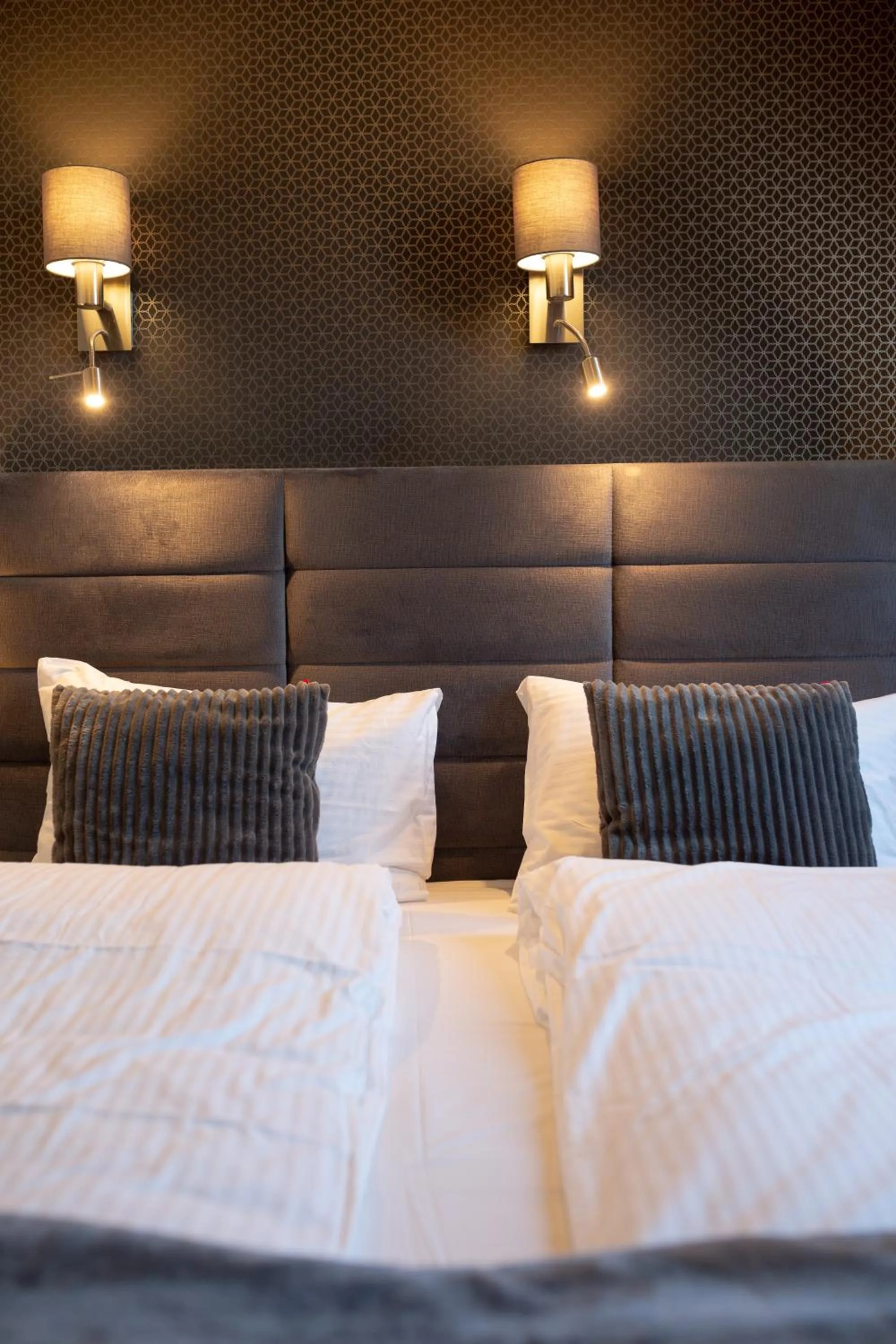 Bed in Aparthotel New Lux