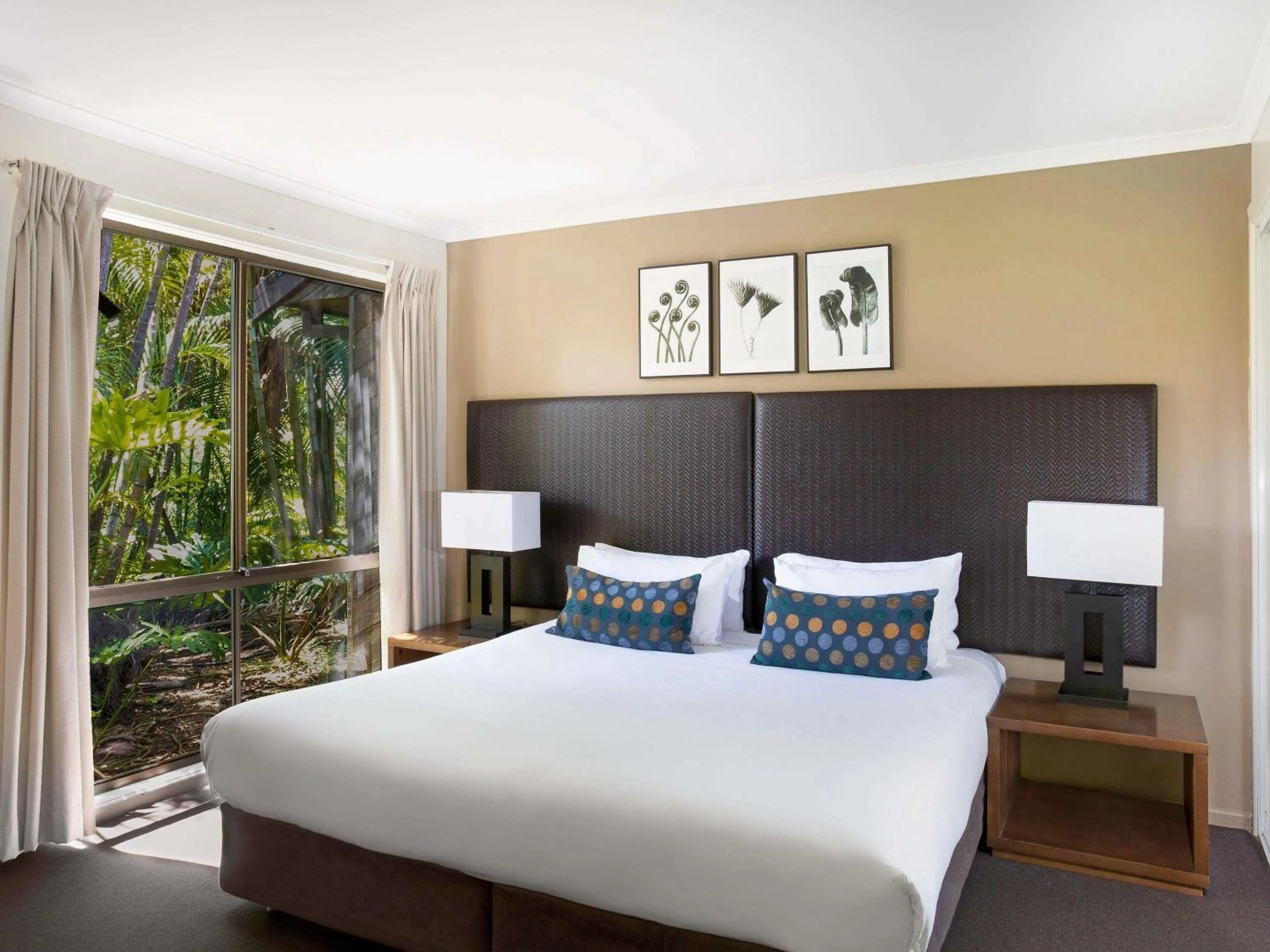 Property building, Bed in BreakFree Aanuka Beach Resort