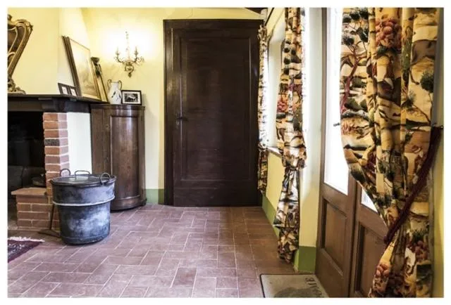 Communal lounge/ TV room in Al Giardino Degli Etruschi