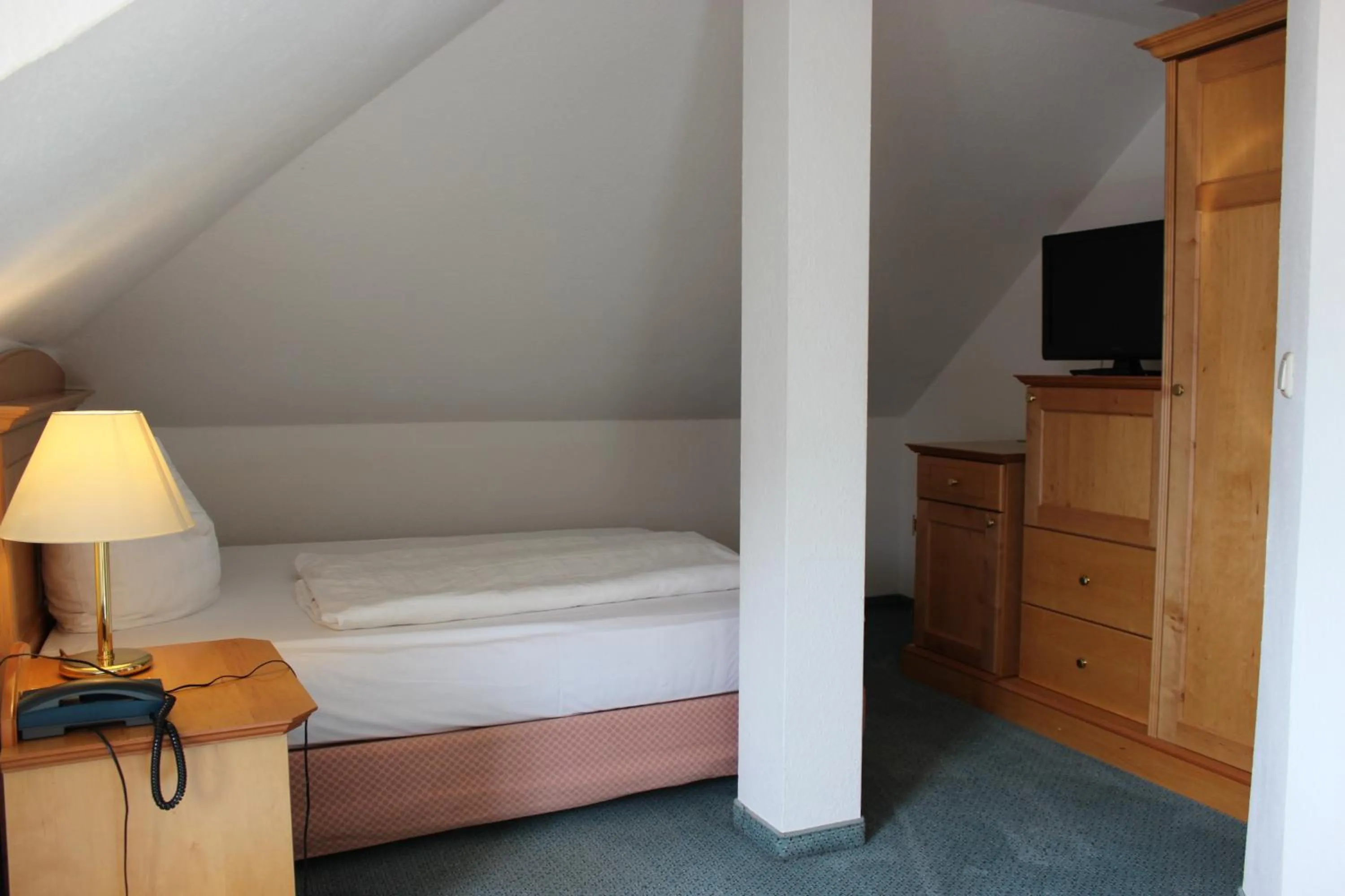 Photo of the whole room, Bed in Meeressterne Hotel Idyll Am Wolgastsee