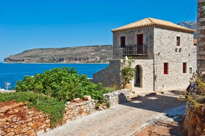 Facade/entrance in Limeni Villa