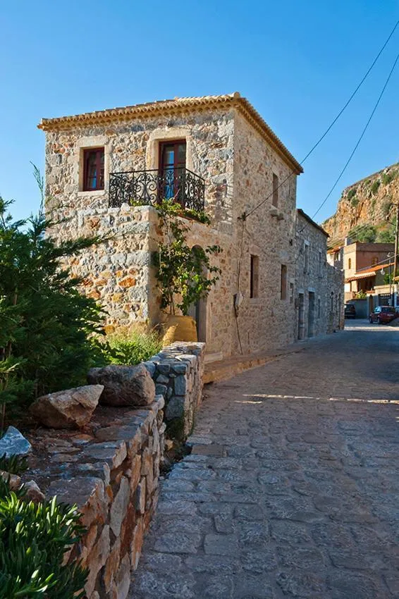 Facade/entrance in Limeni Villa