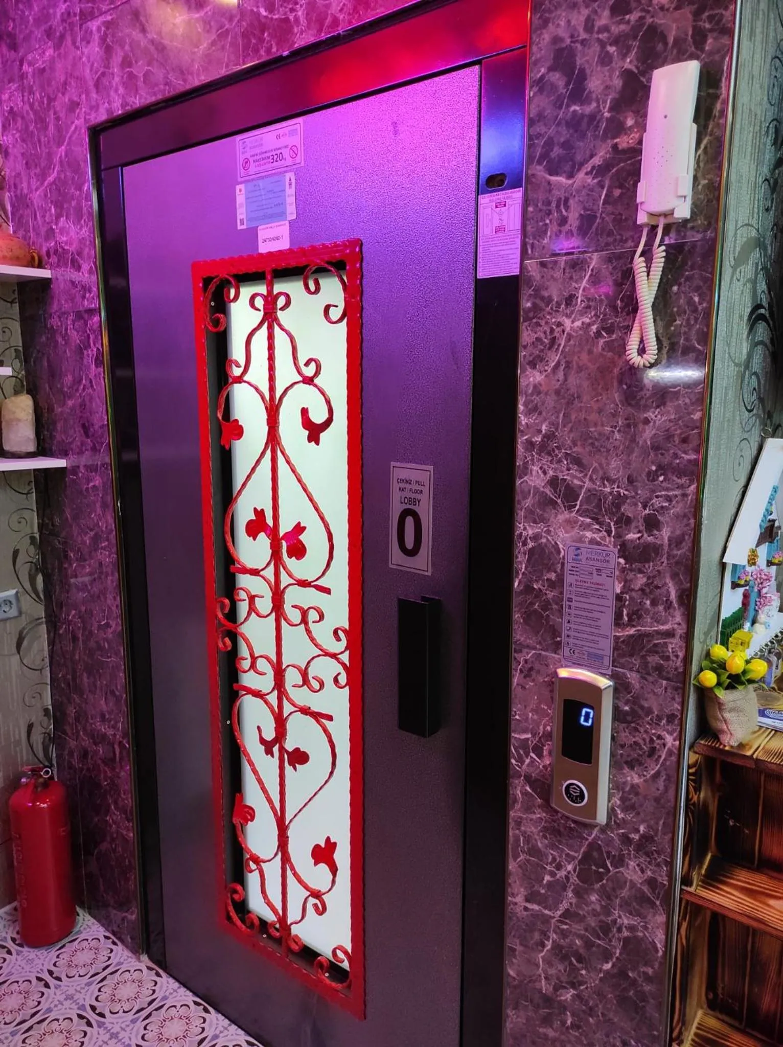 elevator, Bathroom in Marvel Suites