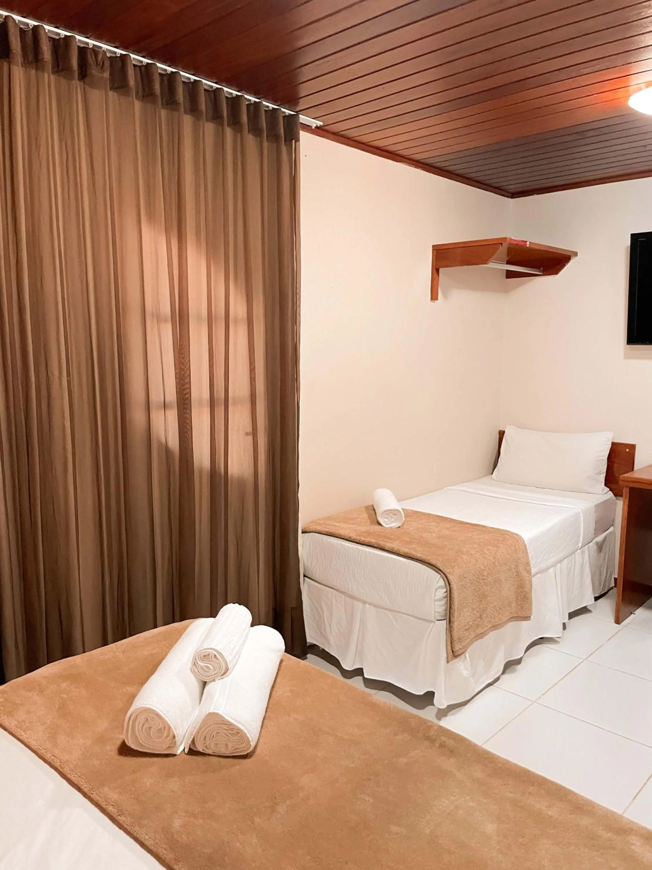 Bed in Hotel Fazenda China Park