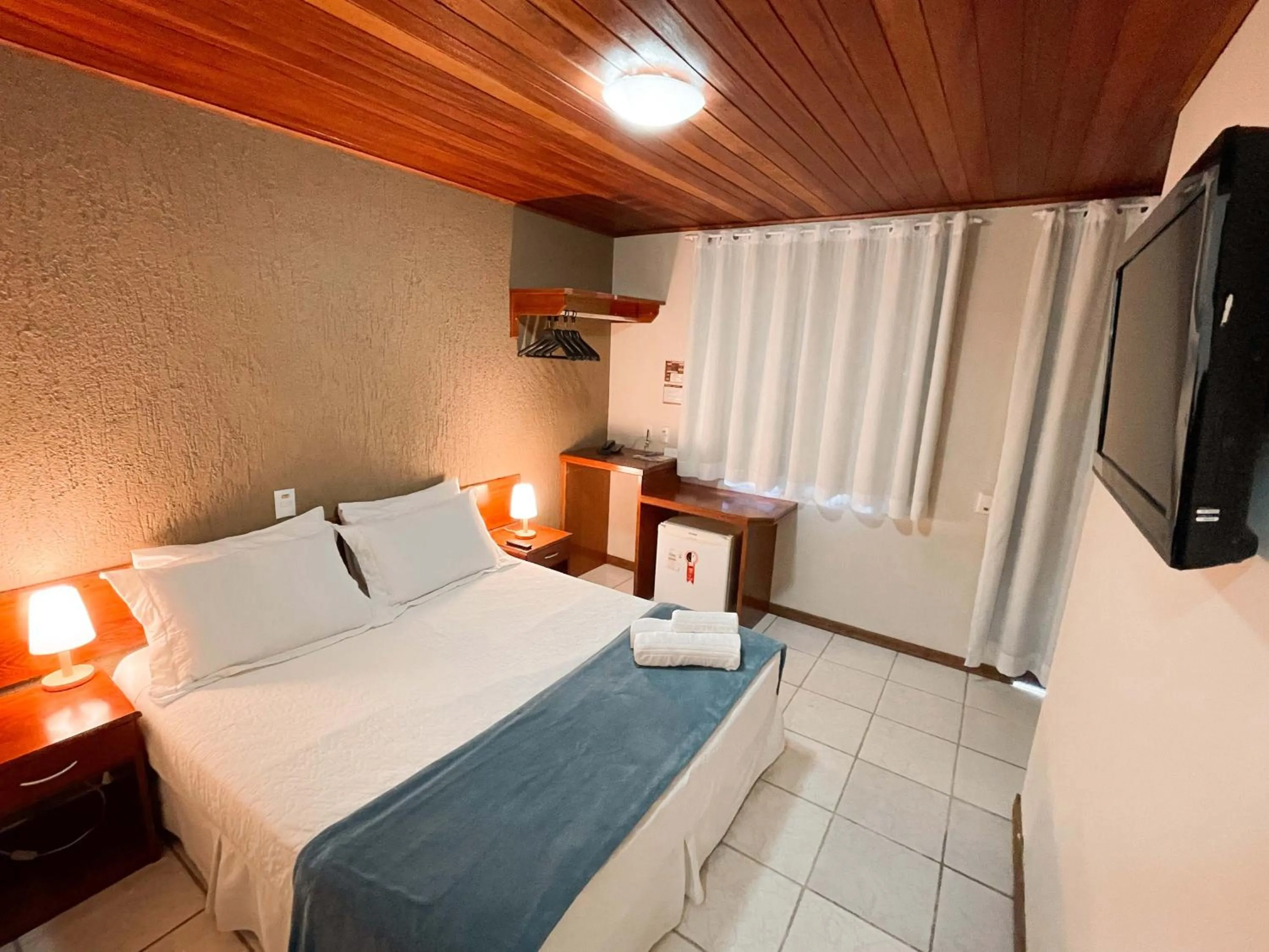 Bed in Hotel Fazenda China Park